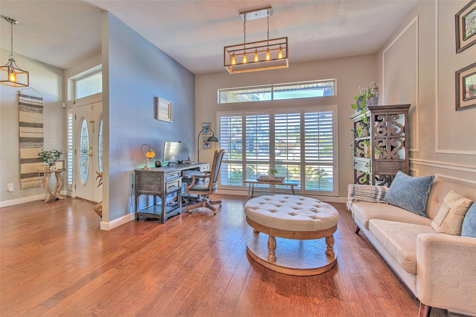 Living Room to the left of Entry, Looking from Kitchen Area
