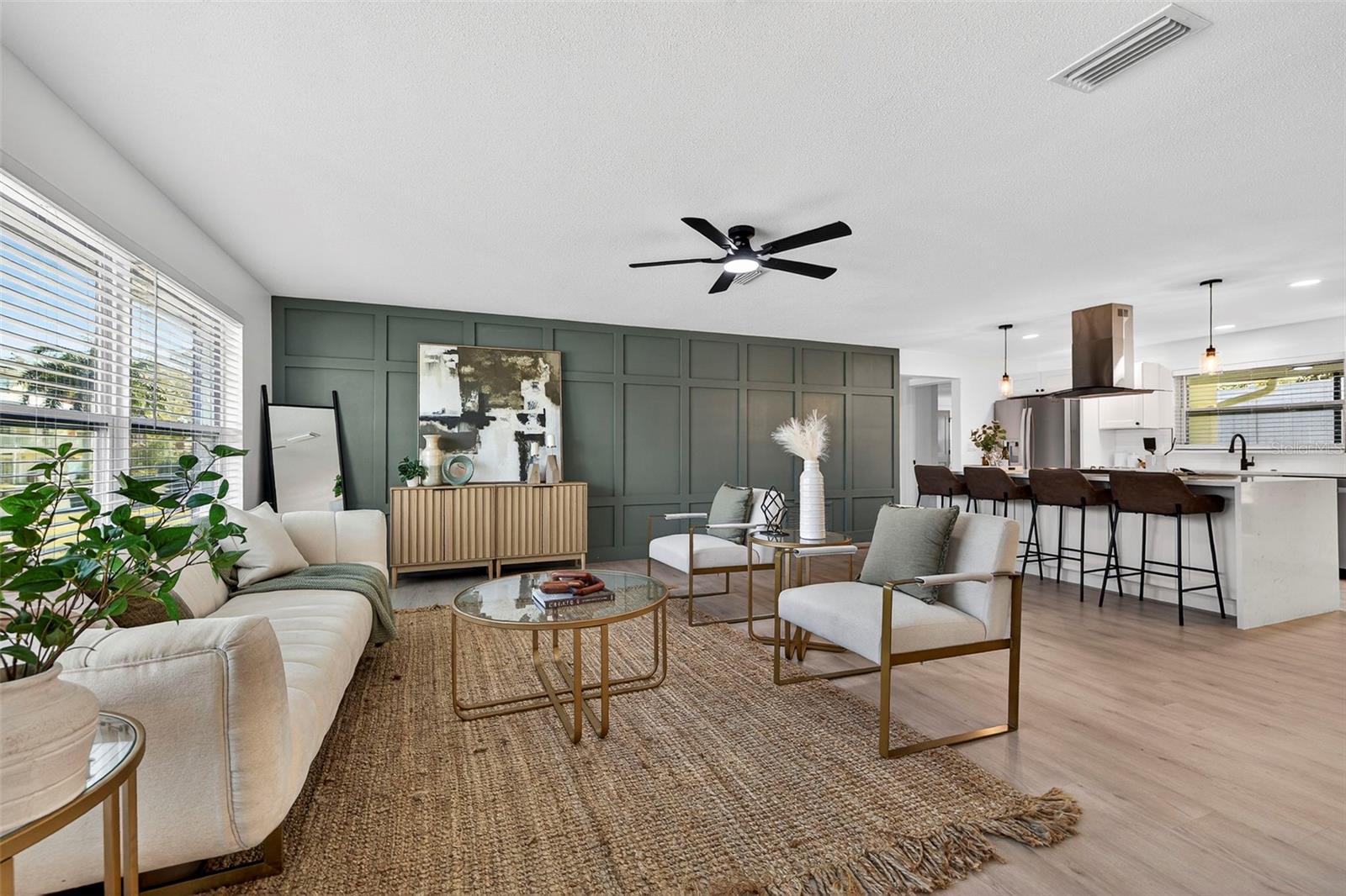 Thoughtful designer upgrades make this living room a true showpiece.