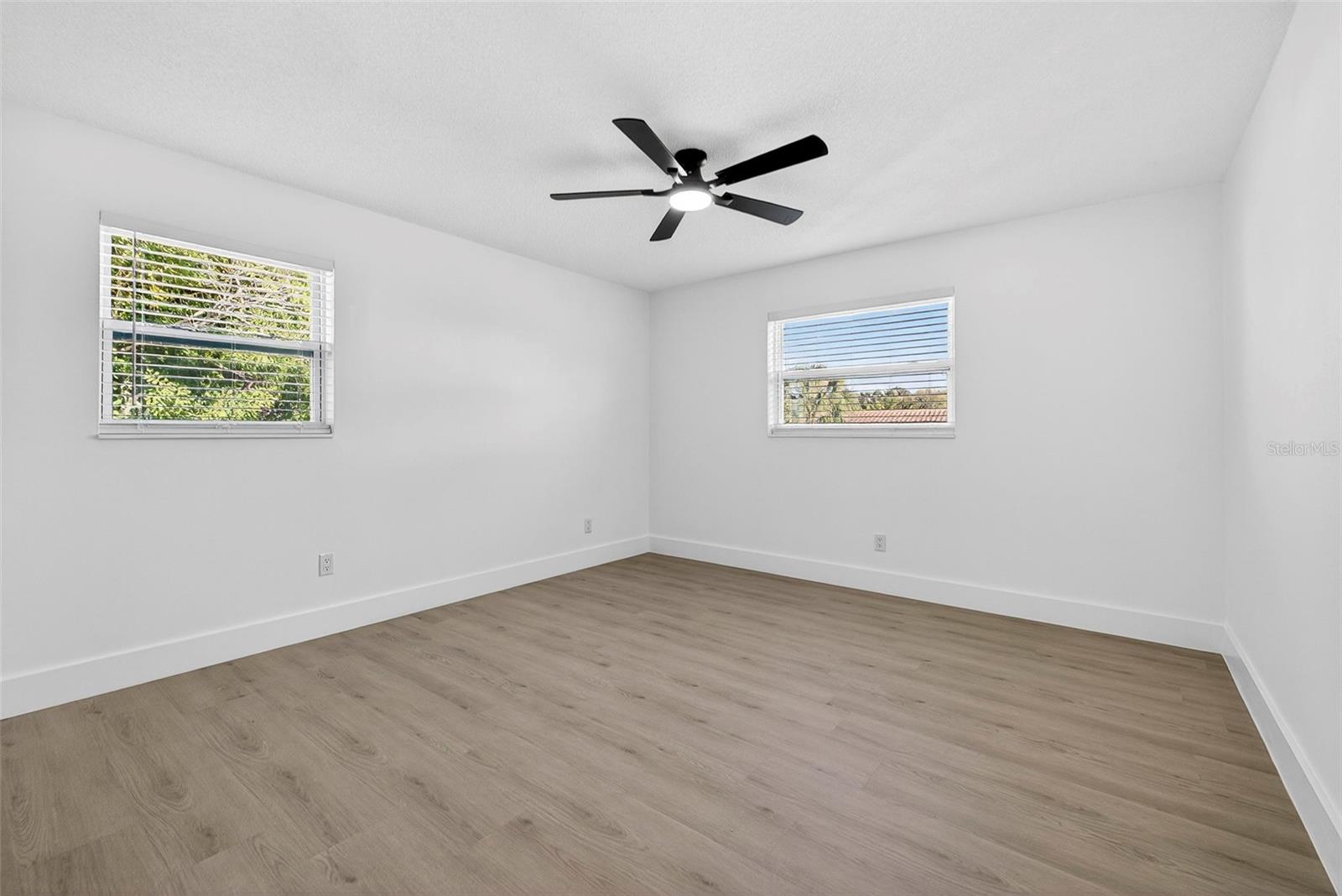 Natural light highlights the open, airy feel of these bedrooms.