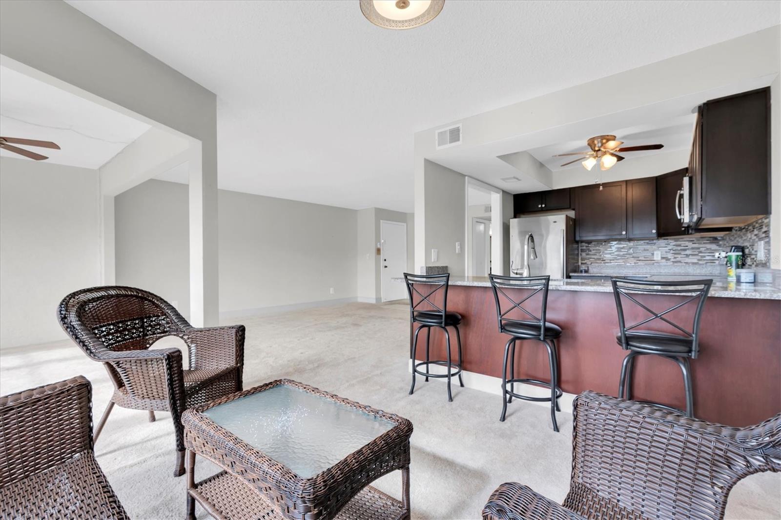 seating area and kitchen