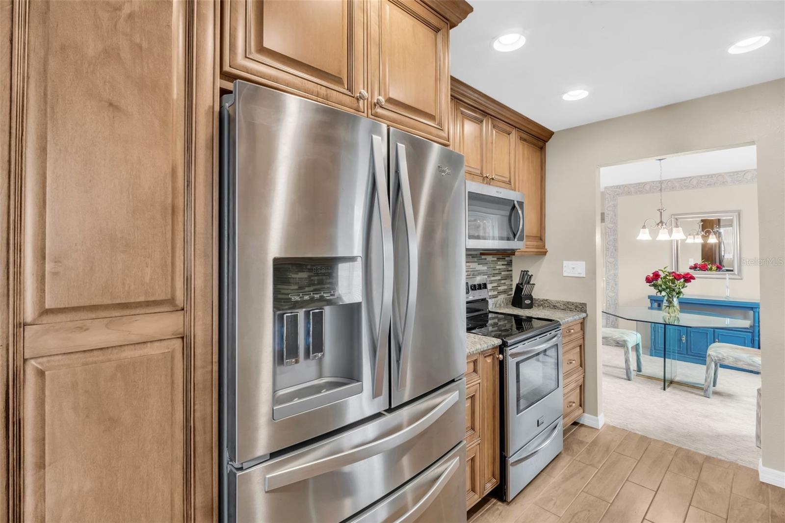 Built-in pantry storage & newer sleek stainless appliances~