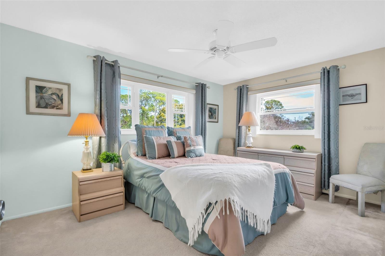 Spacious primary suite big enough for a king~