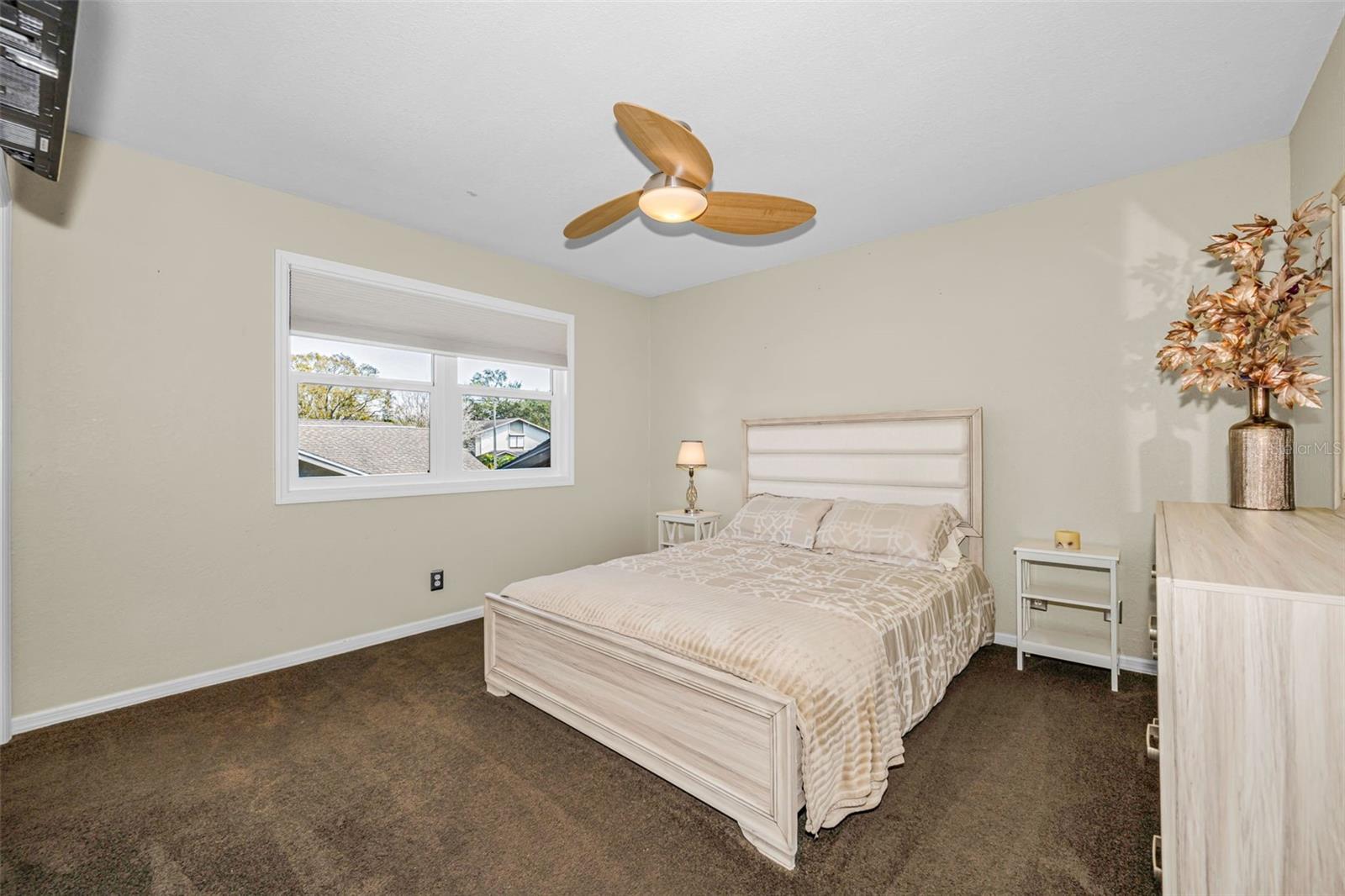 3rd bedroom overlooks side backyard