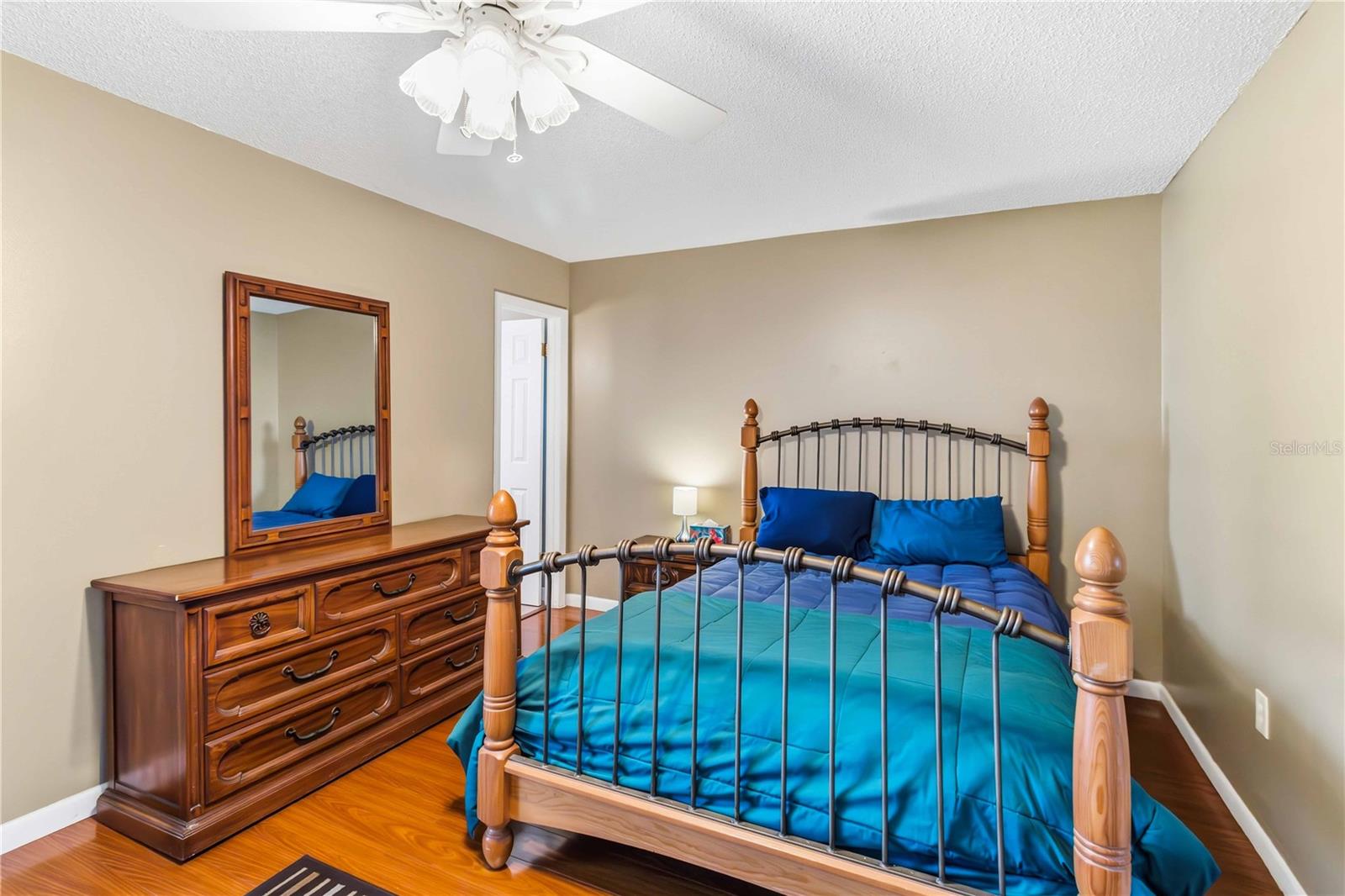 The primary bathroom is just off of the primary bedroom.