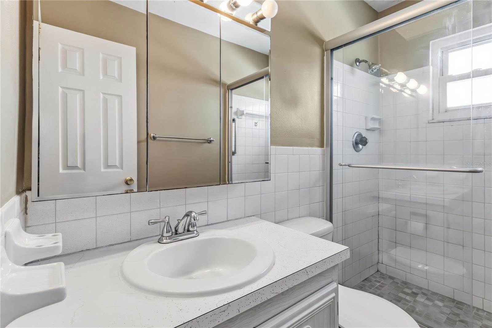 Updated shower stall in the primary bathroom.