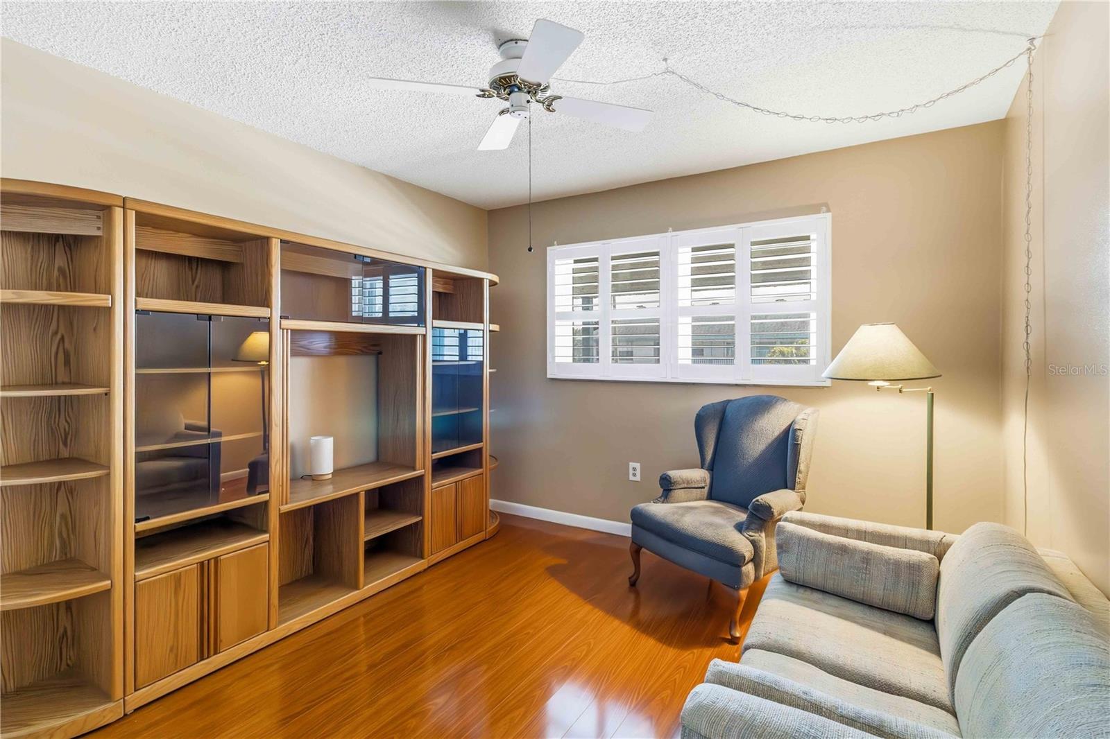 The guest bedroom is currently being used as a sitting room.