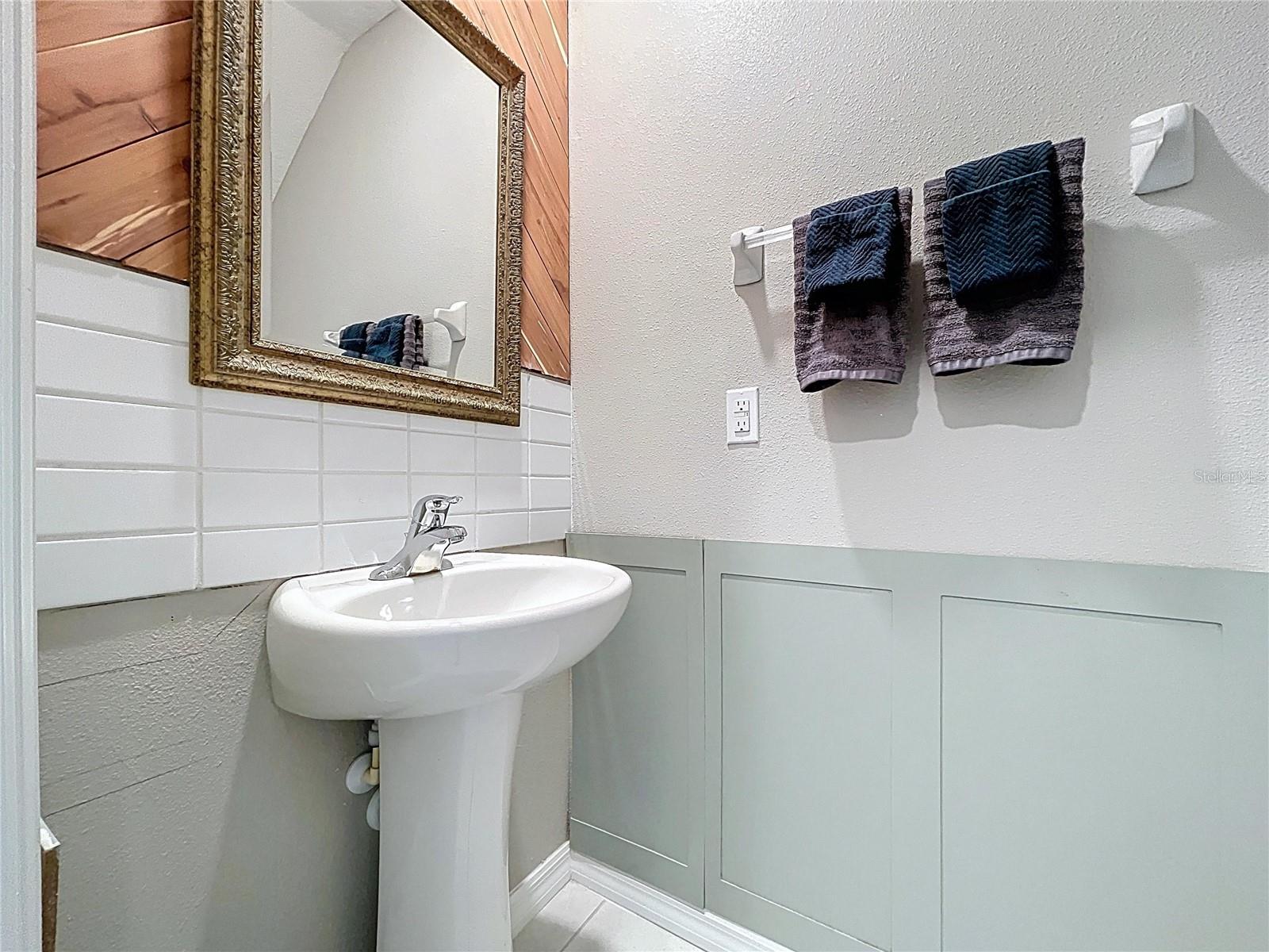 1/2 bath first floor, with pedestal sink.