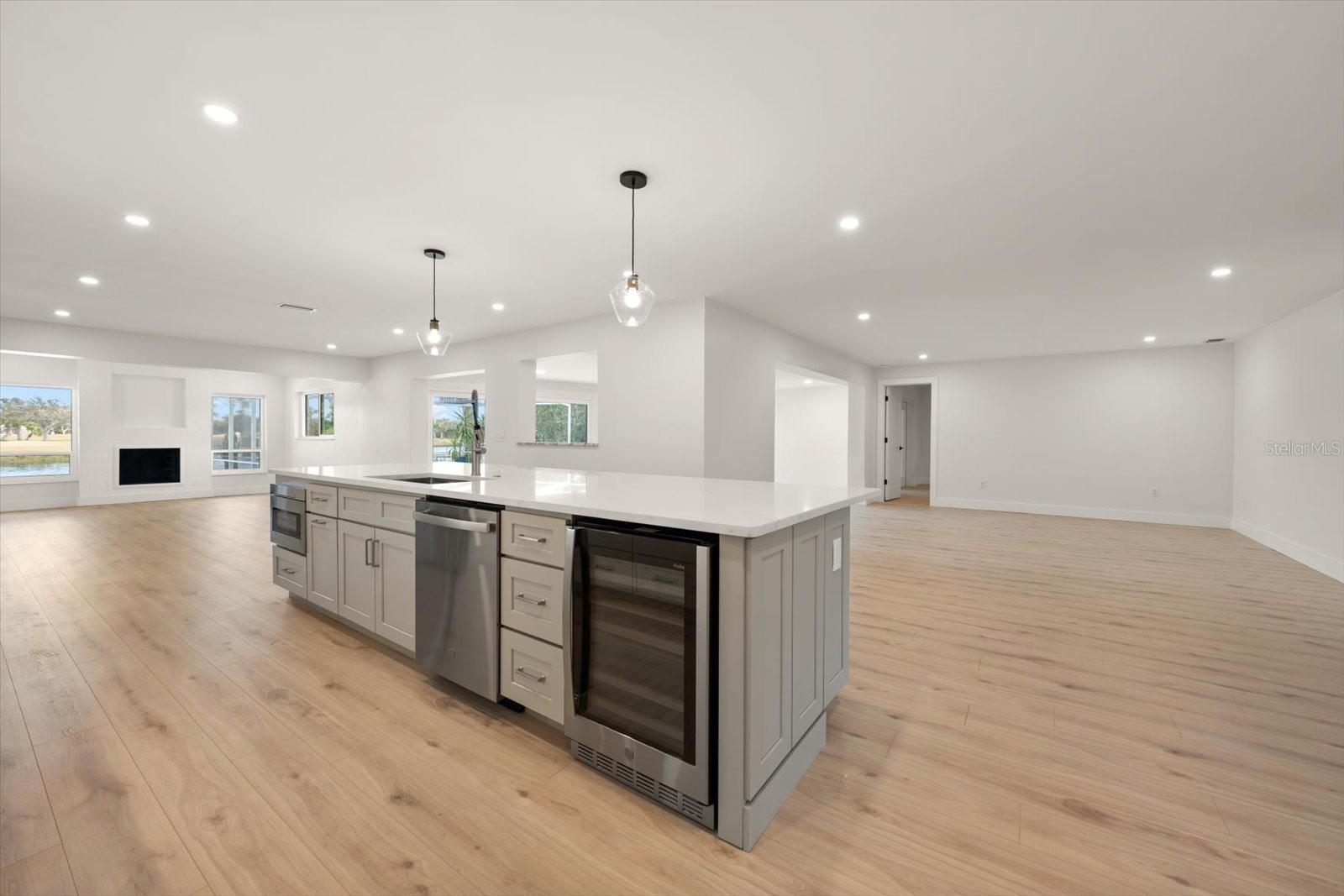 Even has a wine frig