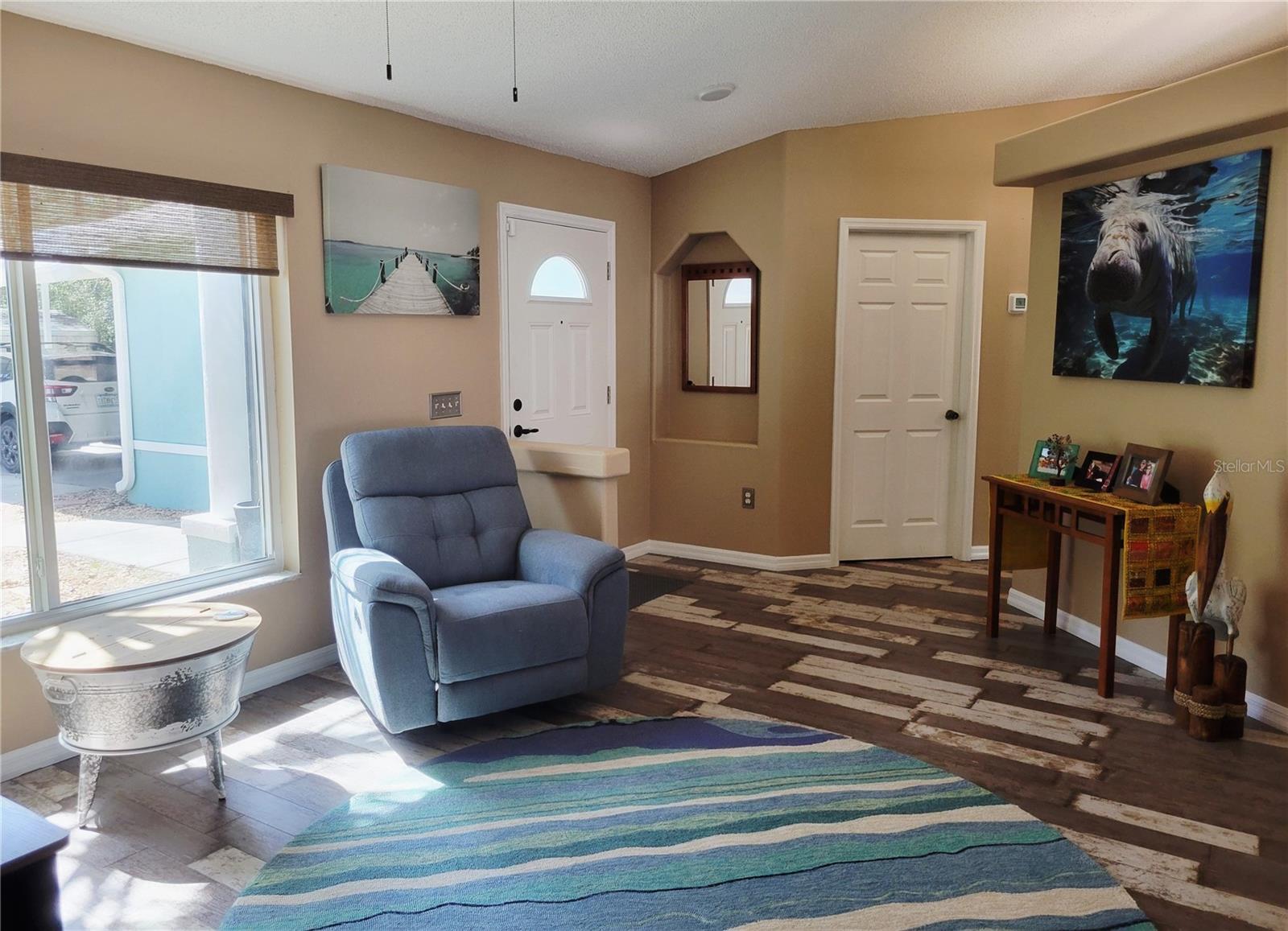 New hurricane impact windows and doors with custom roll shades