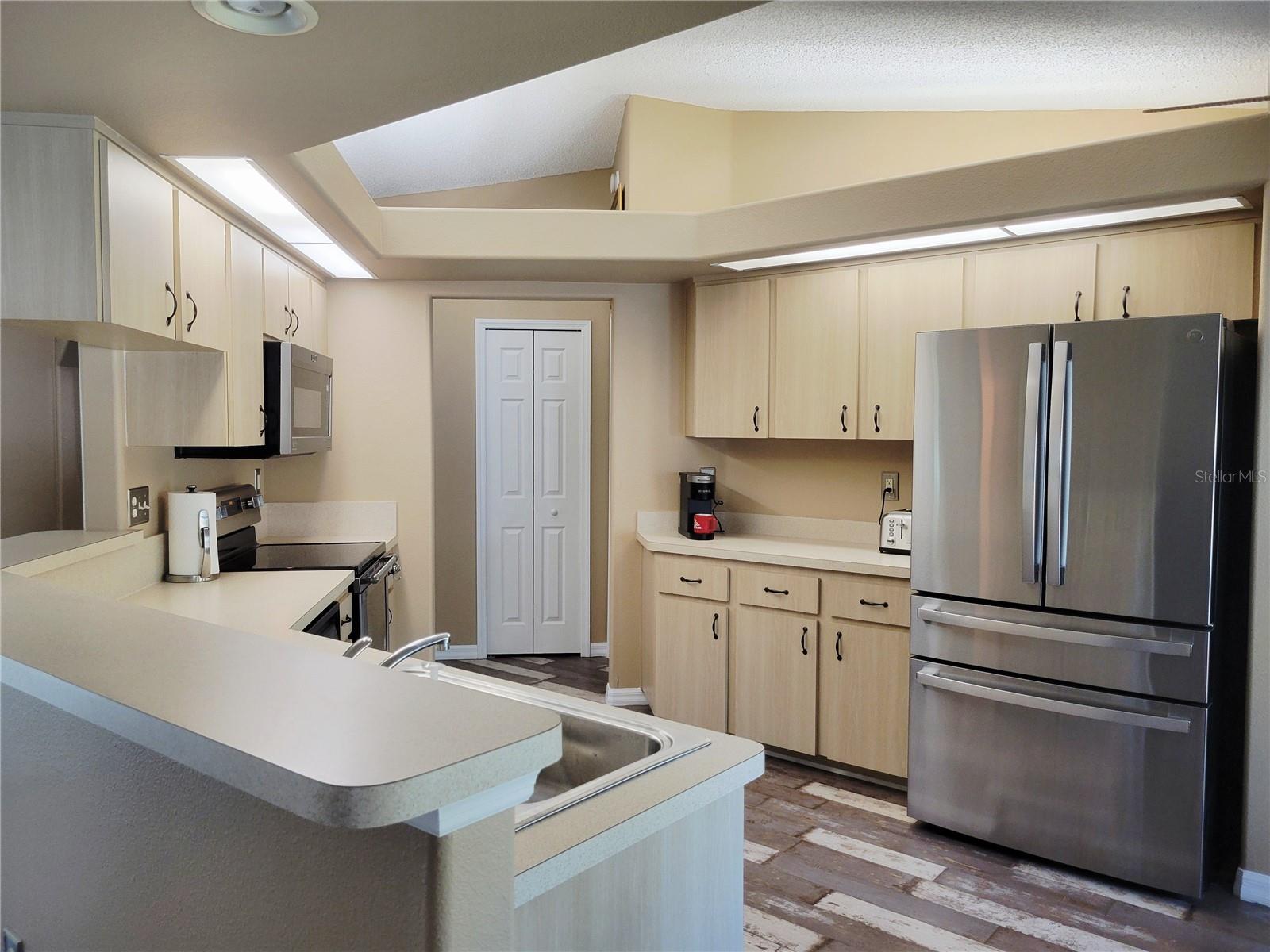 New 4 door stainless steel refrigerator