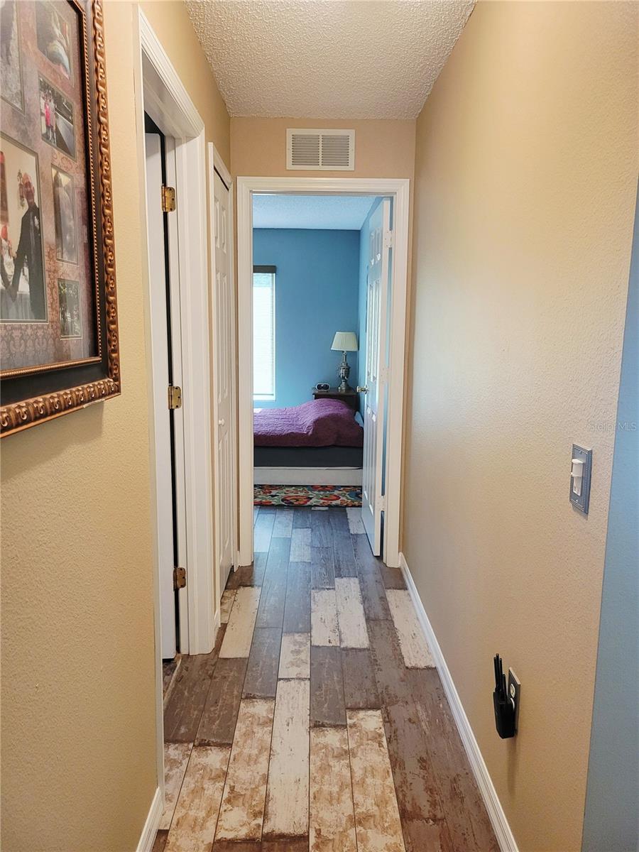 Hallway to bath 2 and Bedroom 3