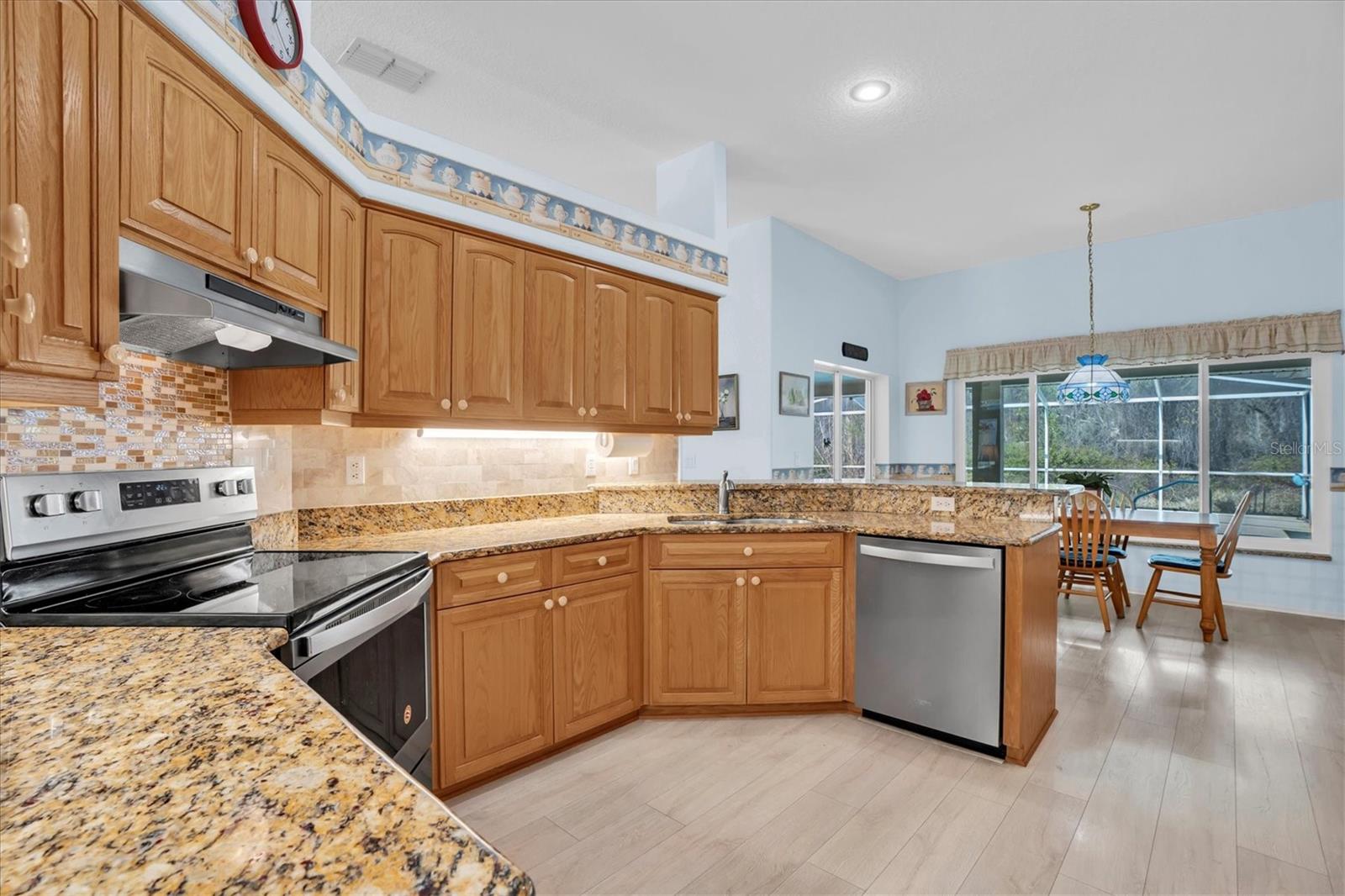 Stainless Steel Appliances - Laminate Floors