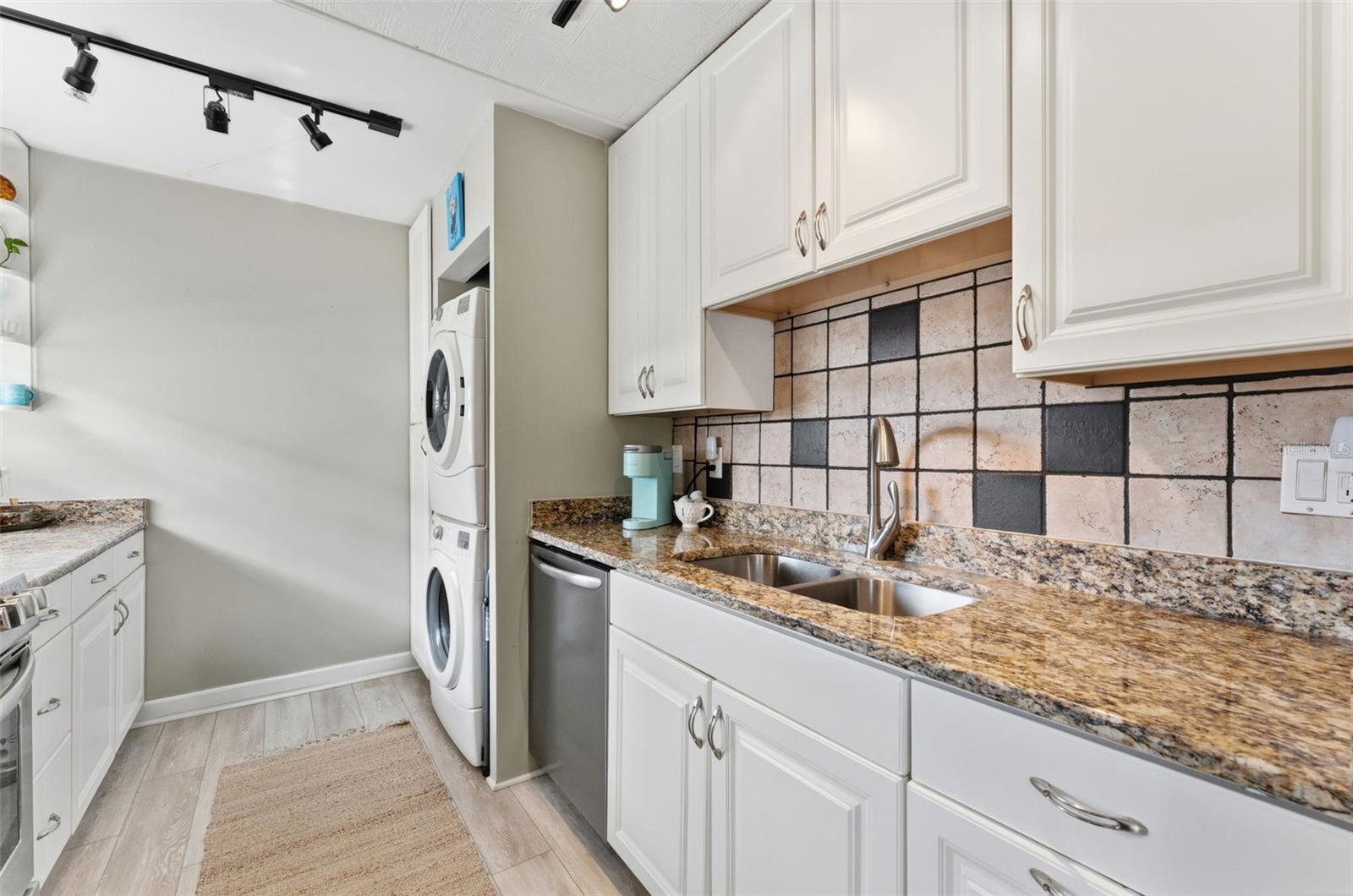 Stylish granite countertops and clean, updated design.