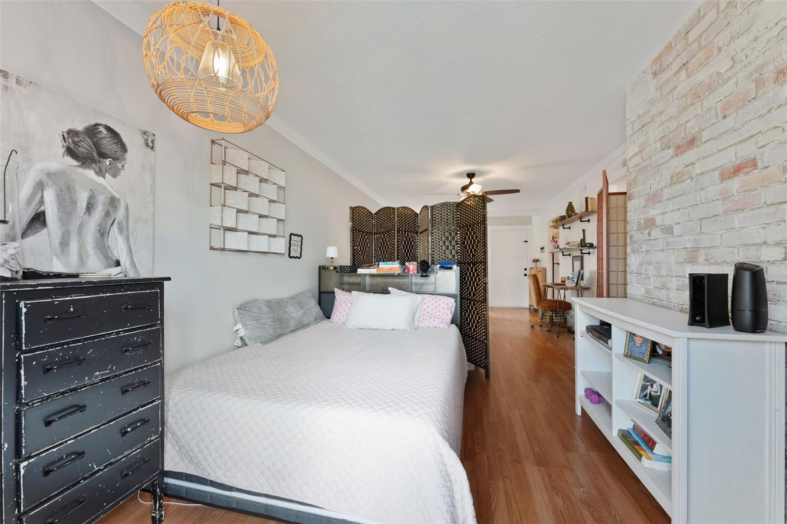 Flexible living space currently set up as a temporary bedroom.