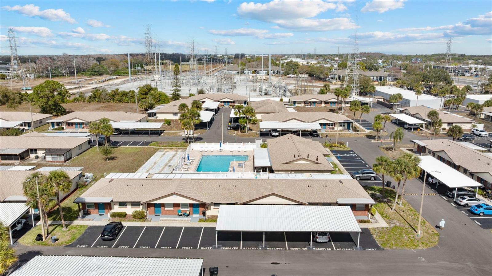 Well-maintained pool area and clubhouse for residents to enjoy.