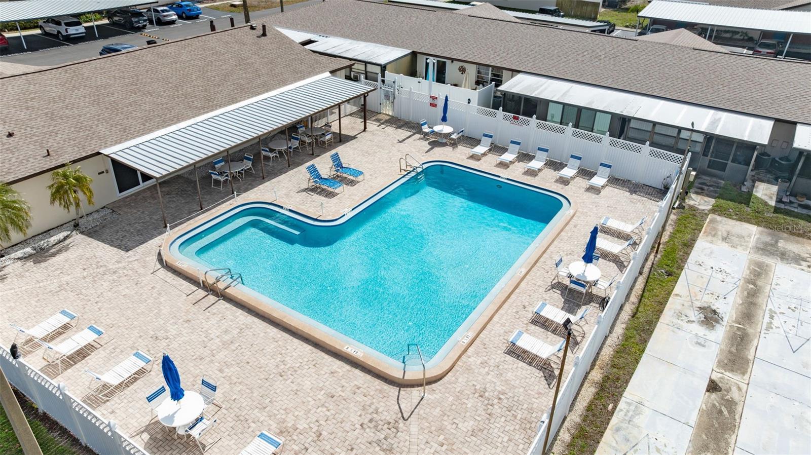 Enjoy the ultimate convenience with the community pool just a short stroll from your front door — perfect for spontaneous swims and soaking up the Florida sunshine anytime.