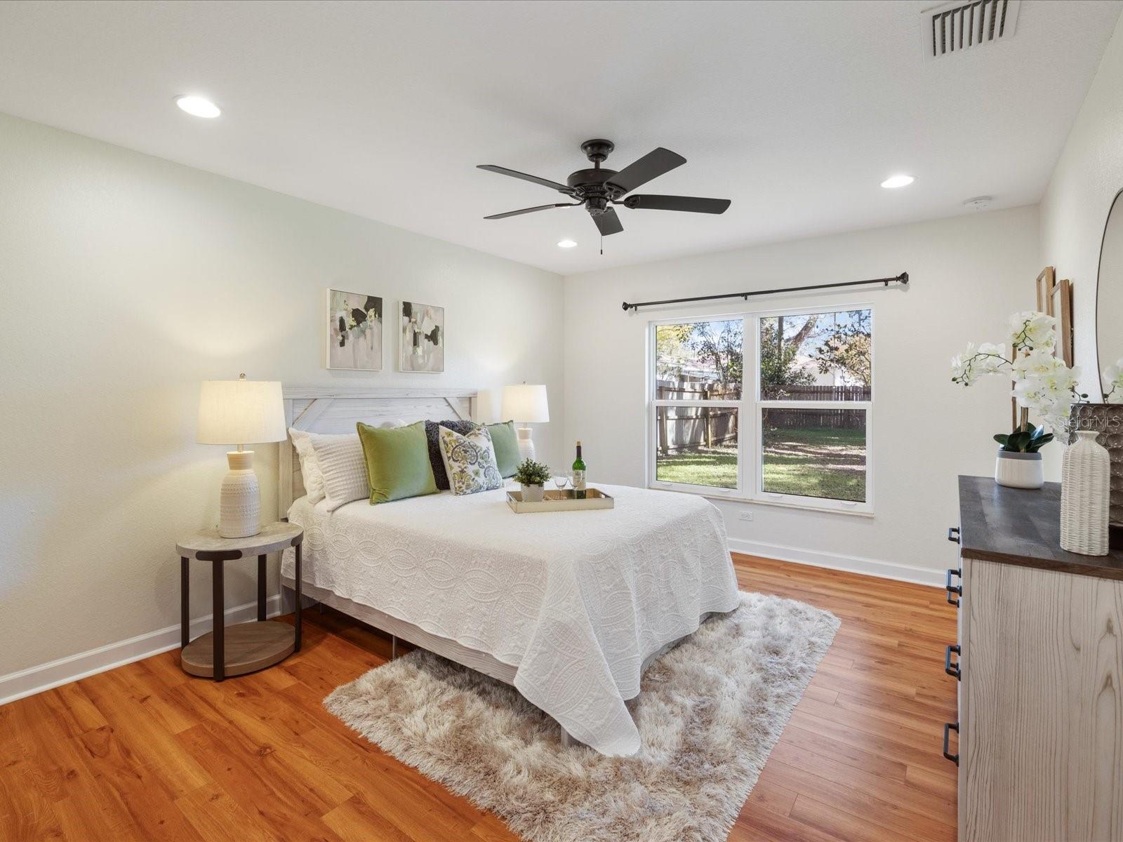 Primary bedroom with impact rated window
