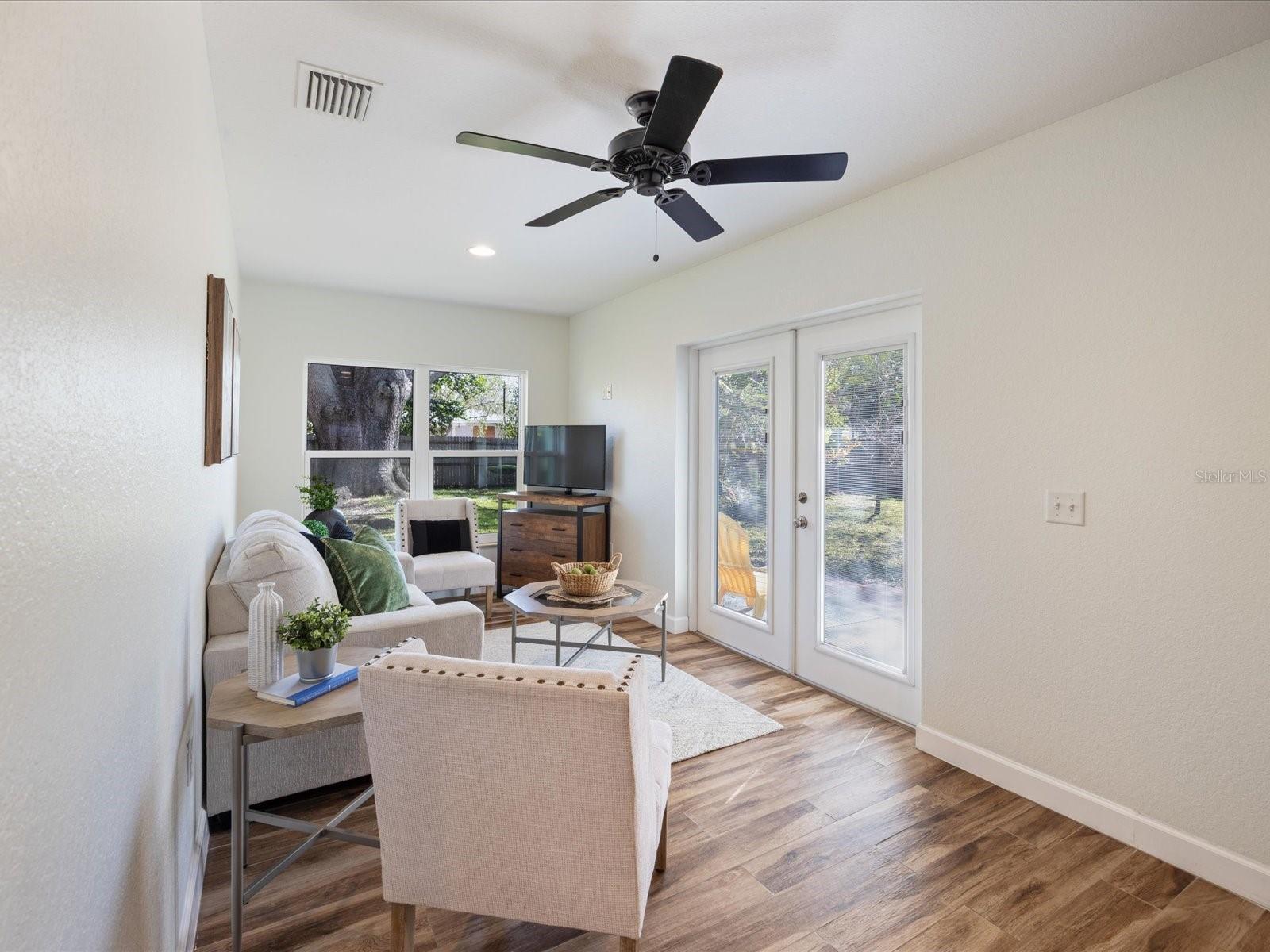 Family room/bonus room addition with impact windows and french doors