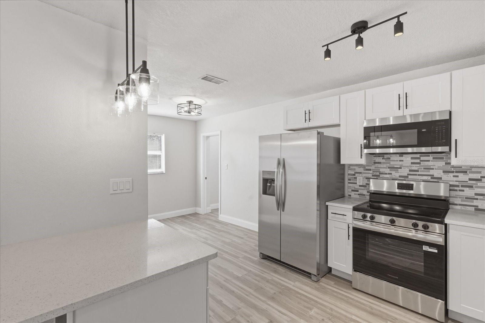 KITCHEN WITH DINING AREA