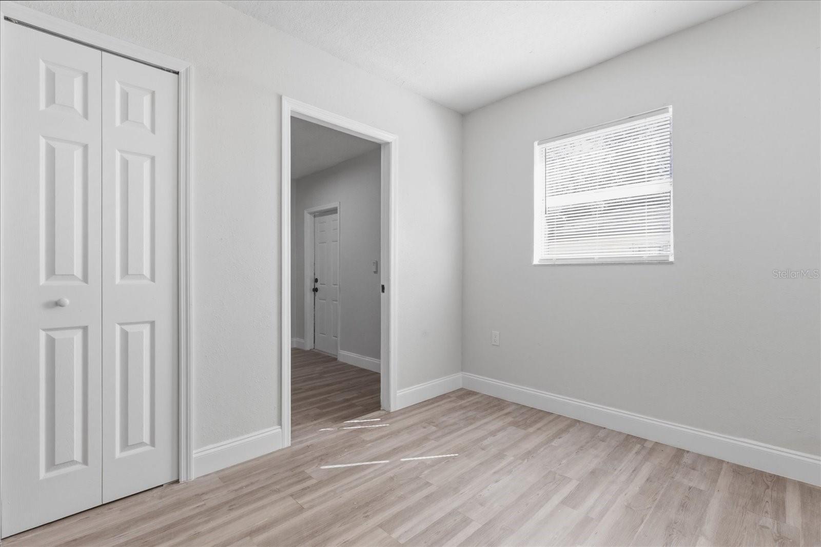 ENTRY TO LAUNDRY AND BEDROOM 5