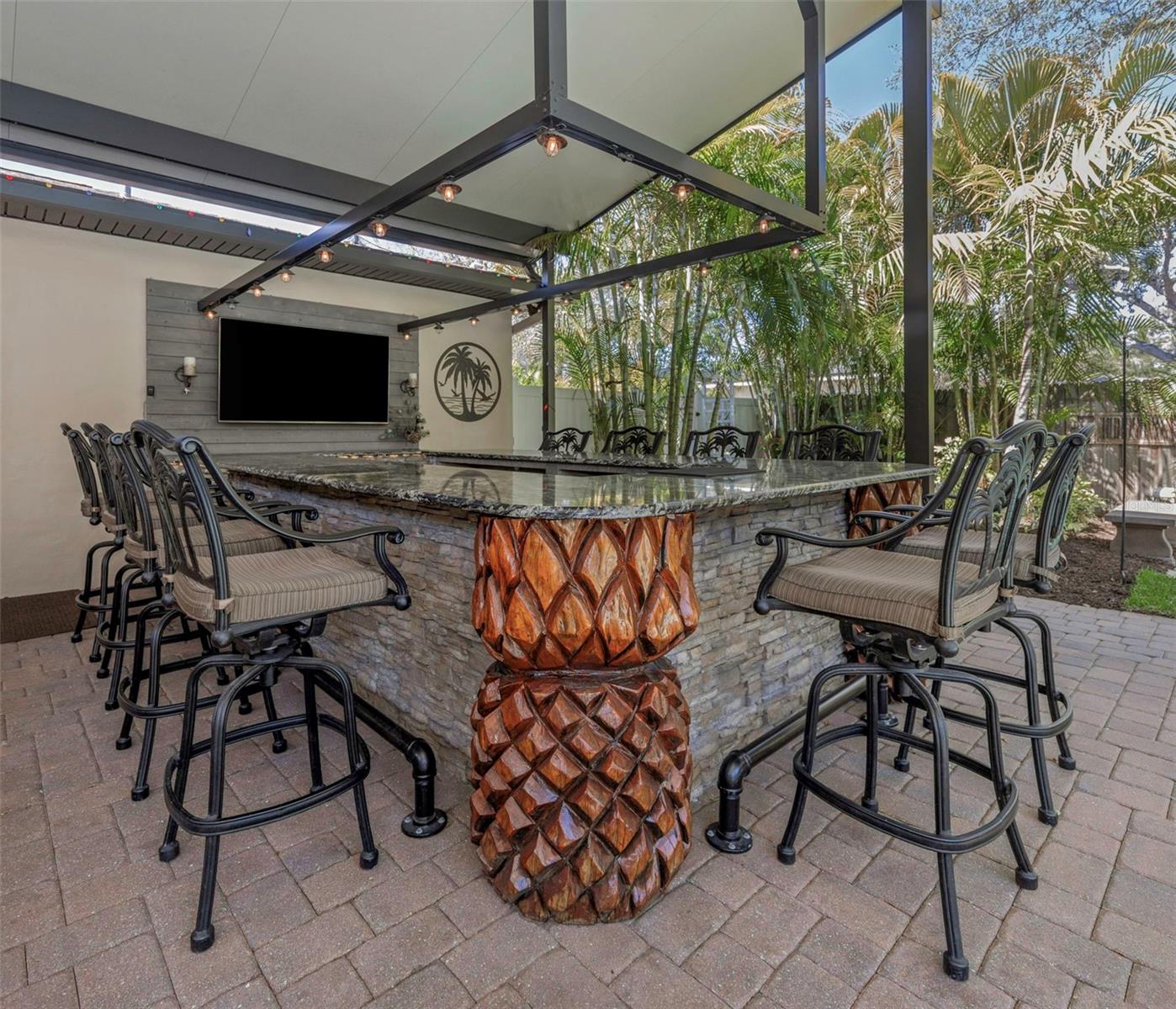 Custom carved Pineapples by Local Tiki artist.