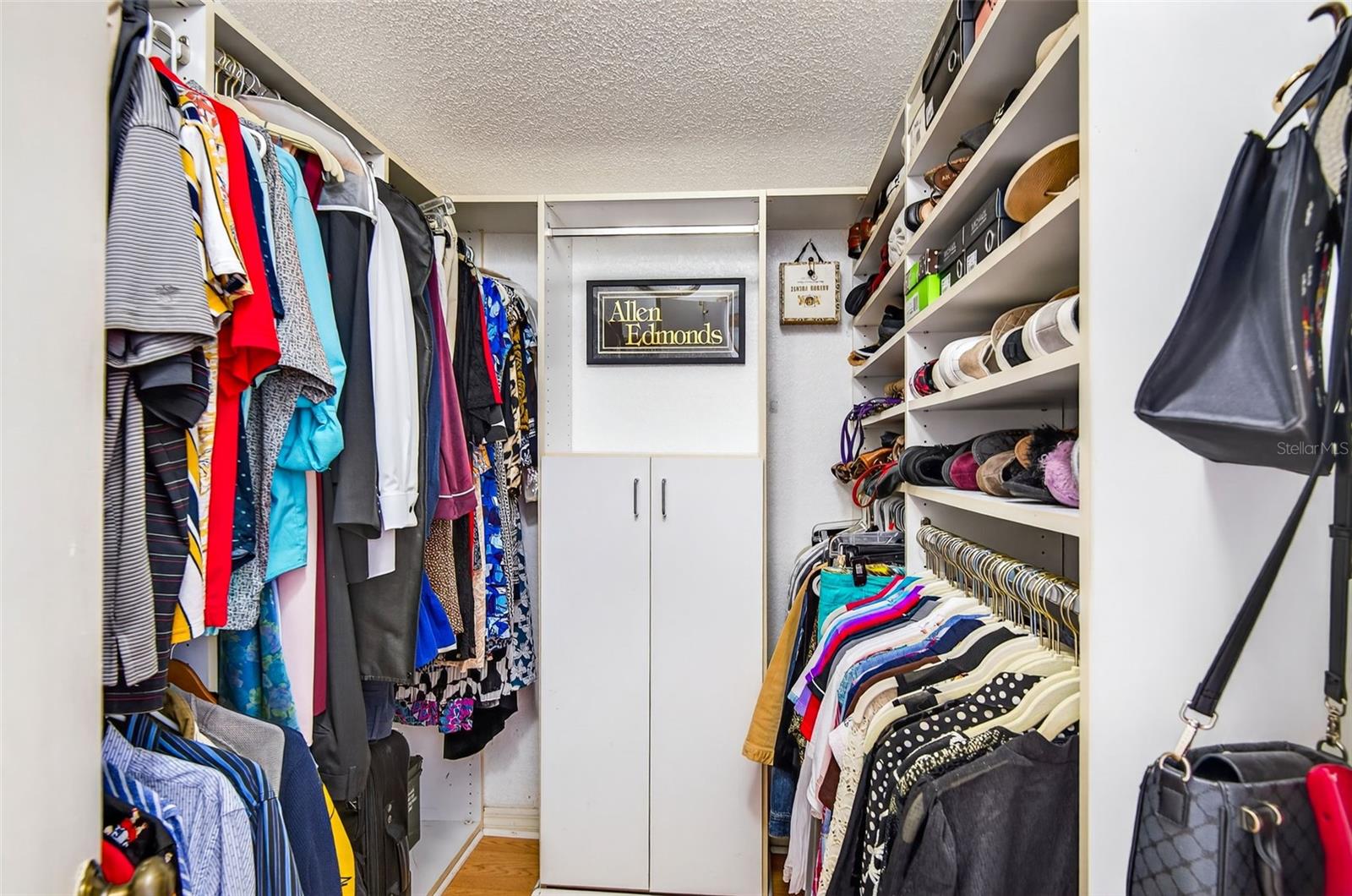 Custom designed master suite walk-in closet