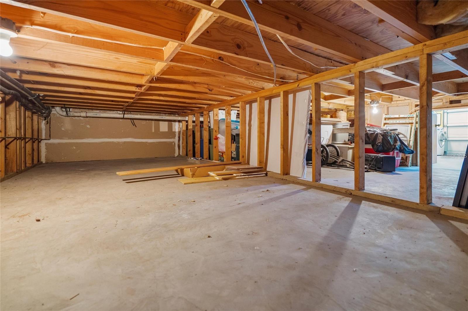 Storage area behind garage and under the great room