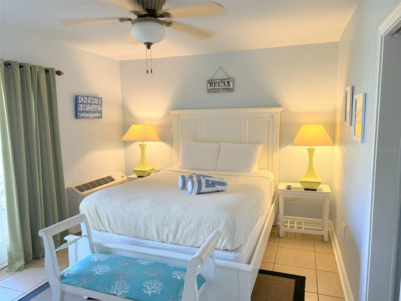 Bedroom includes coastal furniture