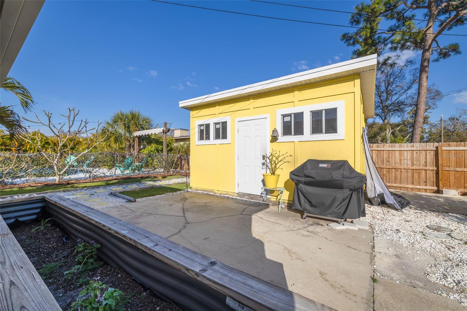 Spacious shed with garage door for easy access