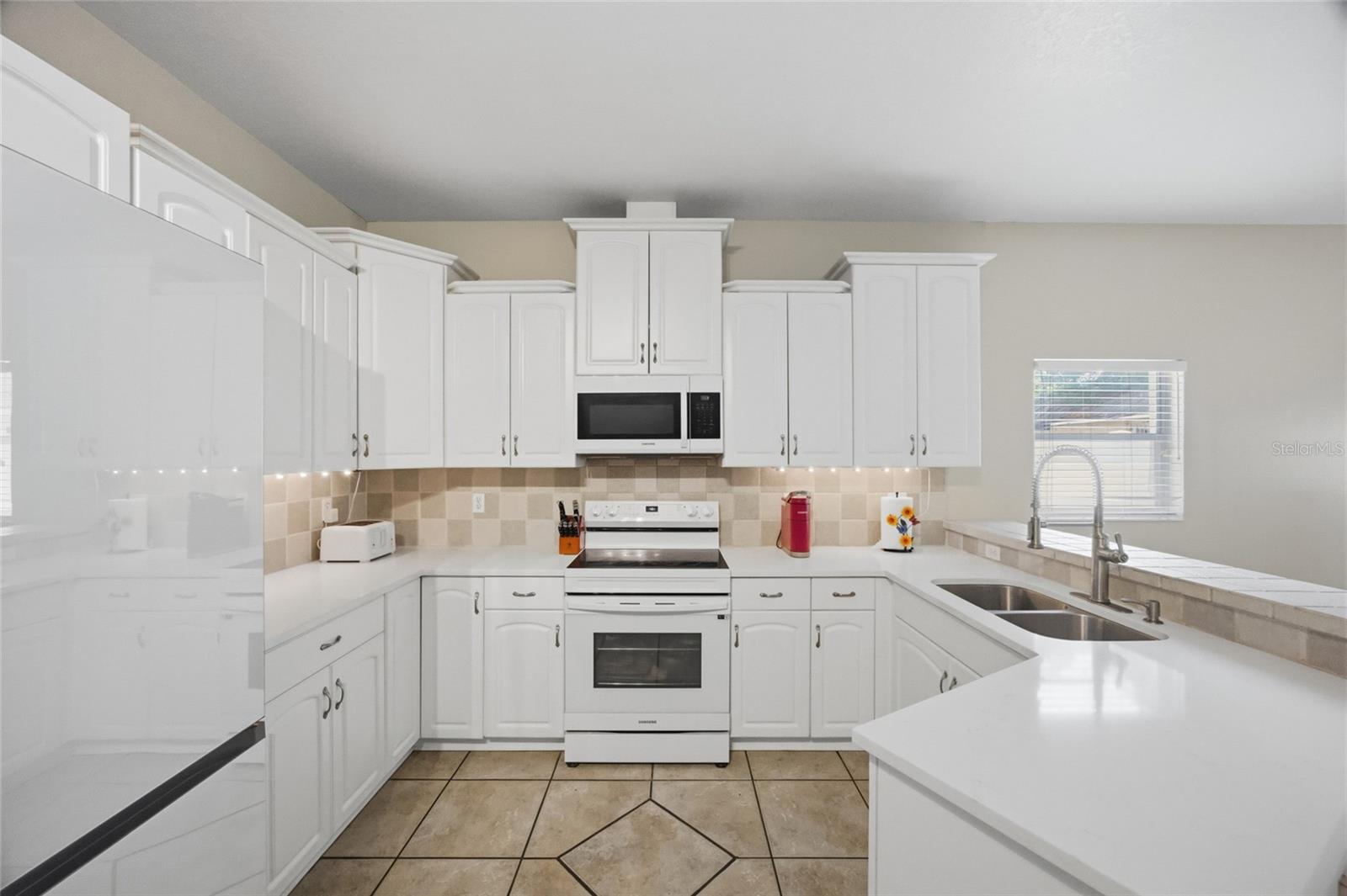 Spacious Kitchen with Bespoke Appliances.