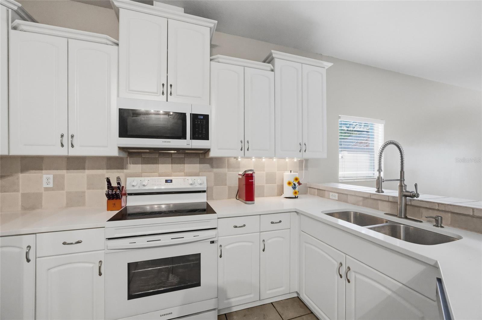 Spacious Kitchen with Bespoke Appliances.