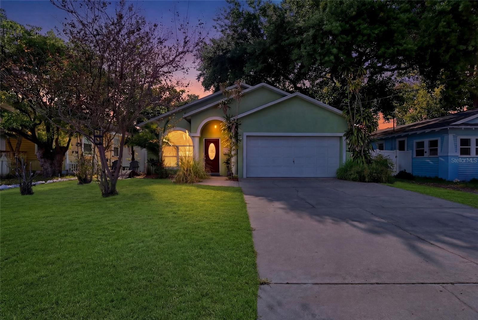 Twilight photo of Exterior of the home, enhanced by AI.