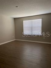 Primary Bedroom with Large Window