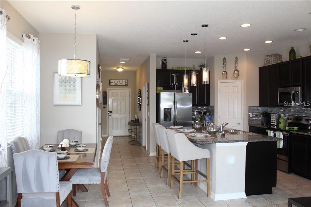 Entry into Kitchen, Dinette and Living Room on First Floor