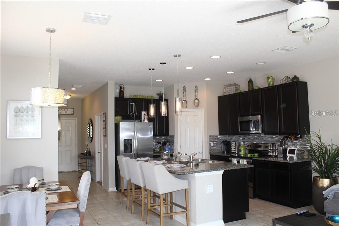 First Floor Kitchen, Dinette and Living Room to relax and entertain