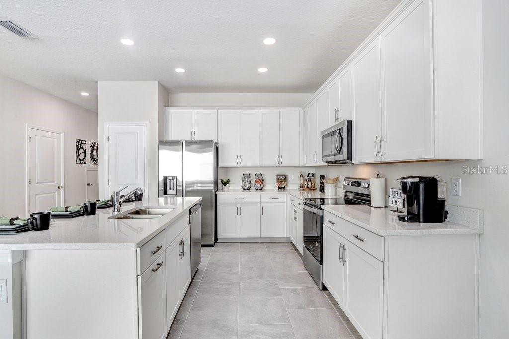Big Kitchen with Lots of Cabinet Space! (photo of model home)