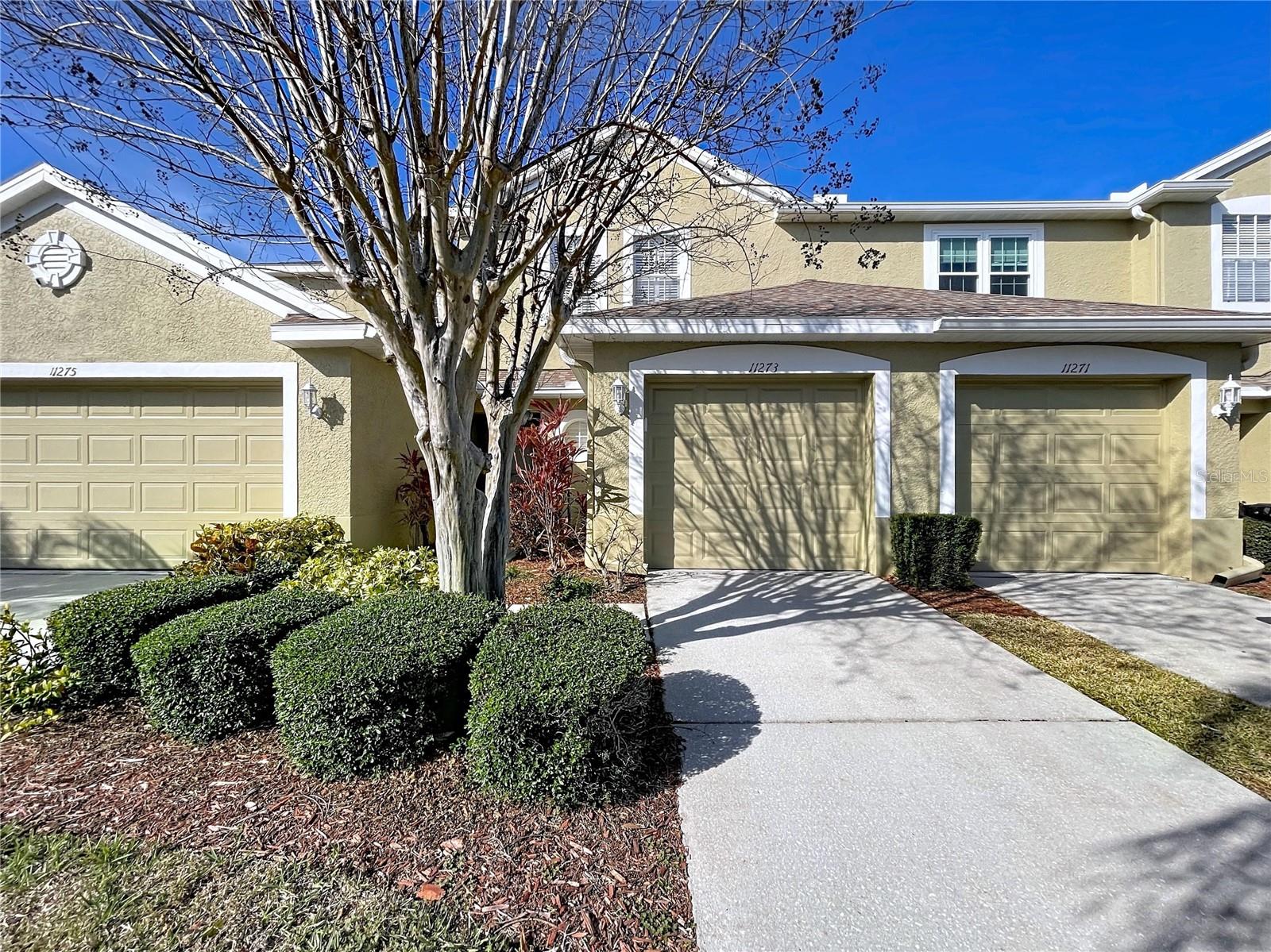 Private driveway with an oversized 1-car garage.