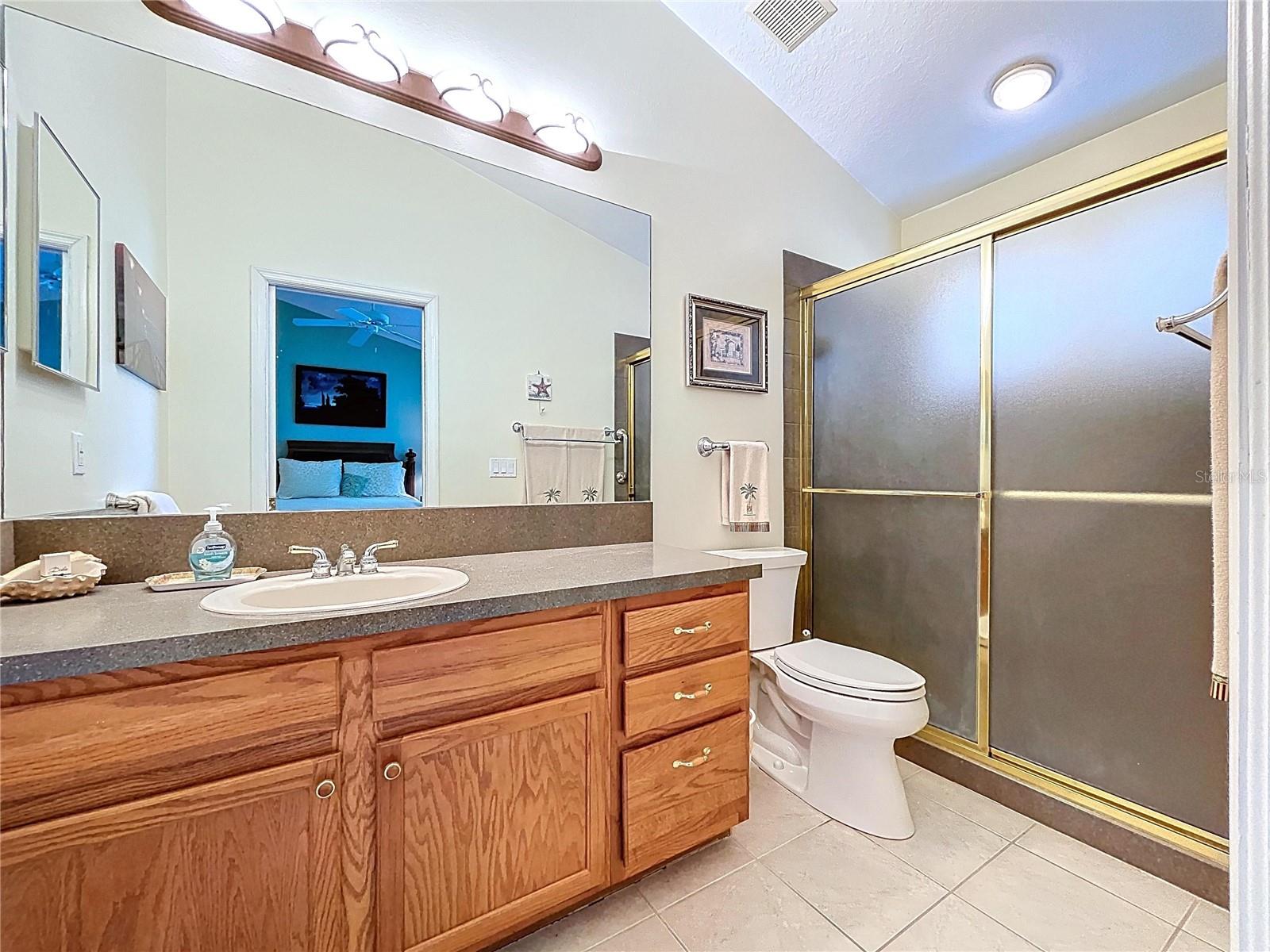 The Primary bathroom is large and offers a walk-in shower.
