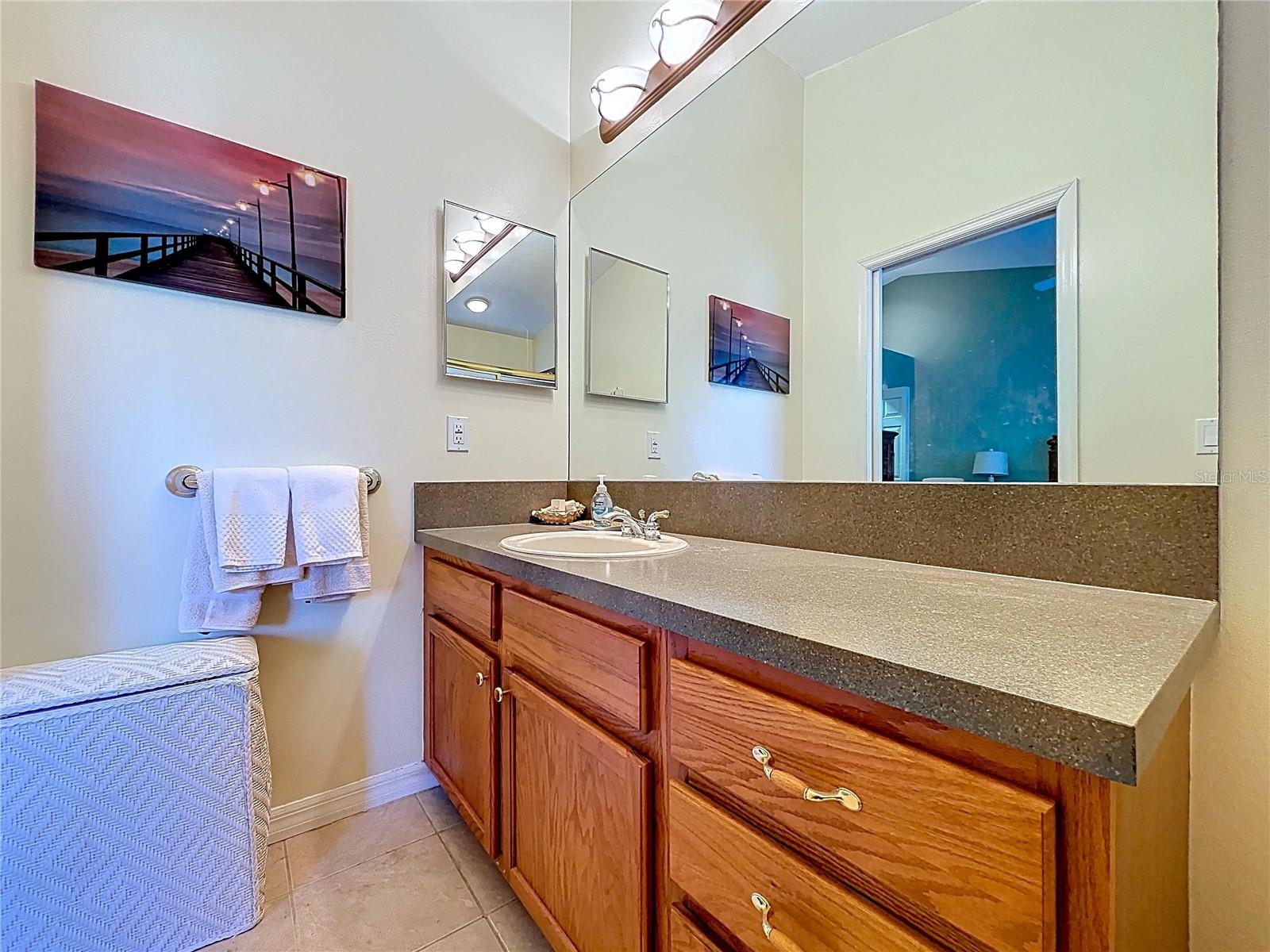 The Primary bathroom is large and offers a walk-in shower.