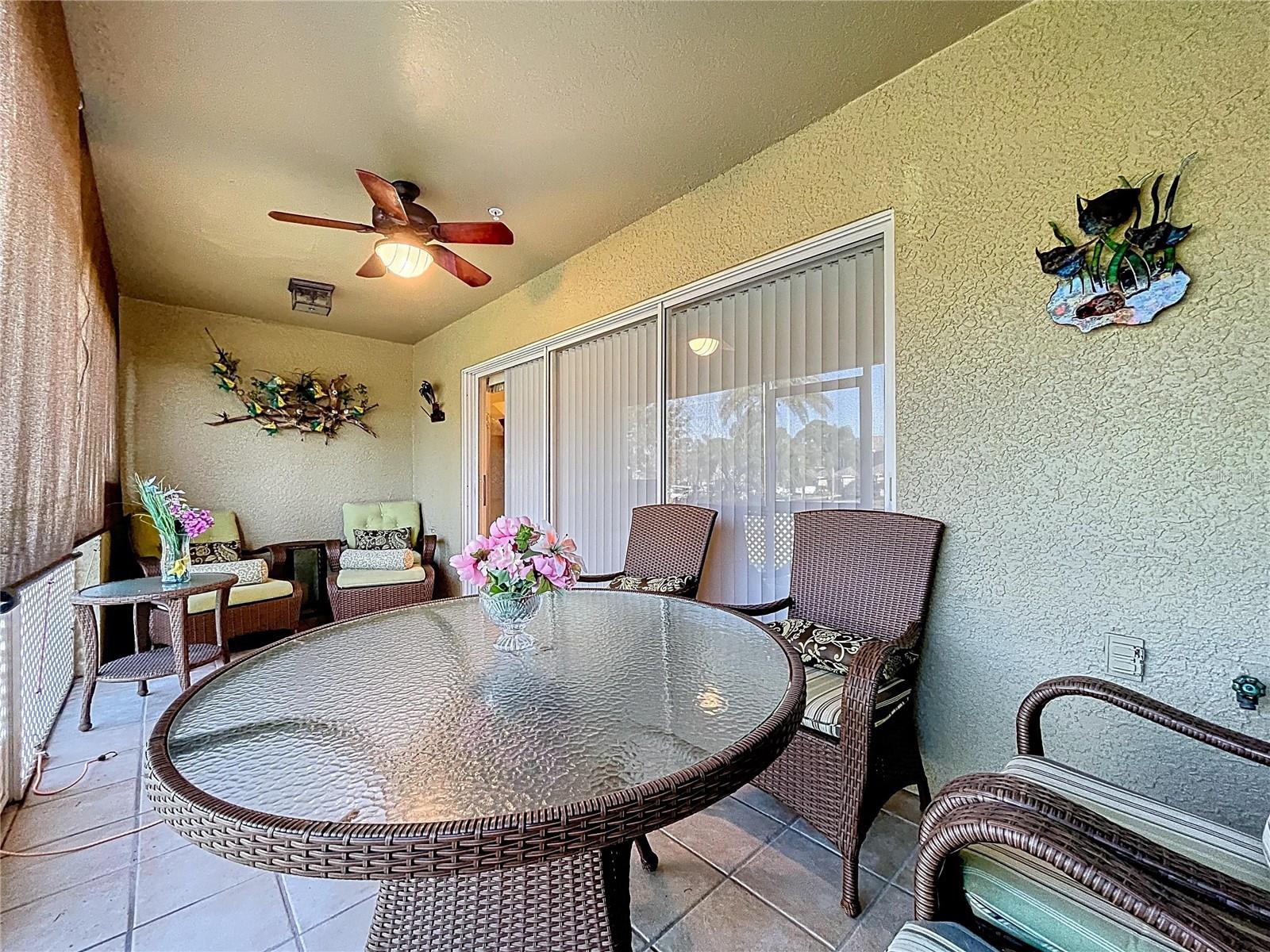 The rear screened patio offers an outdoor space to take in the Florida warm air.