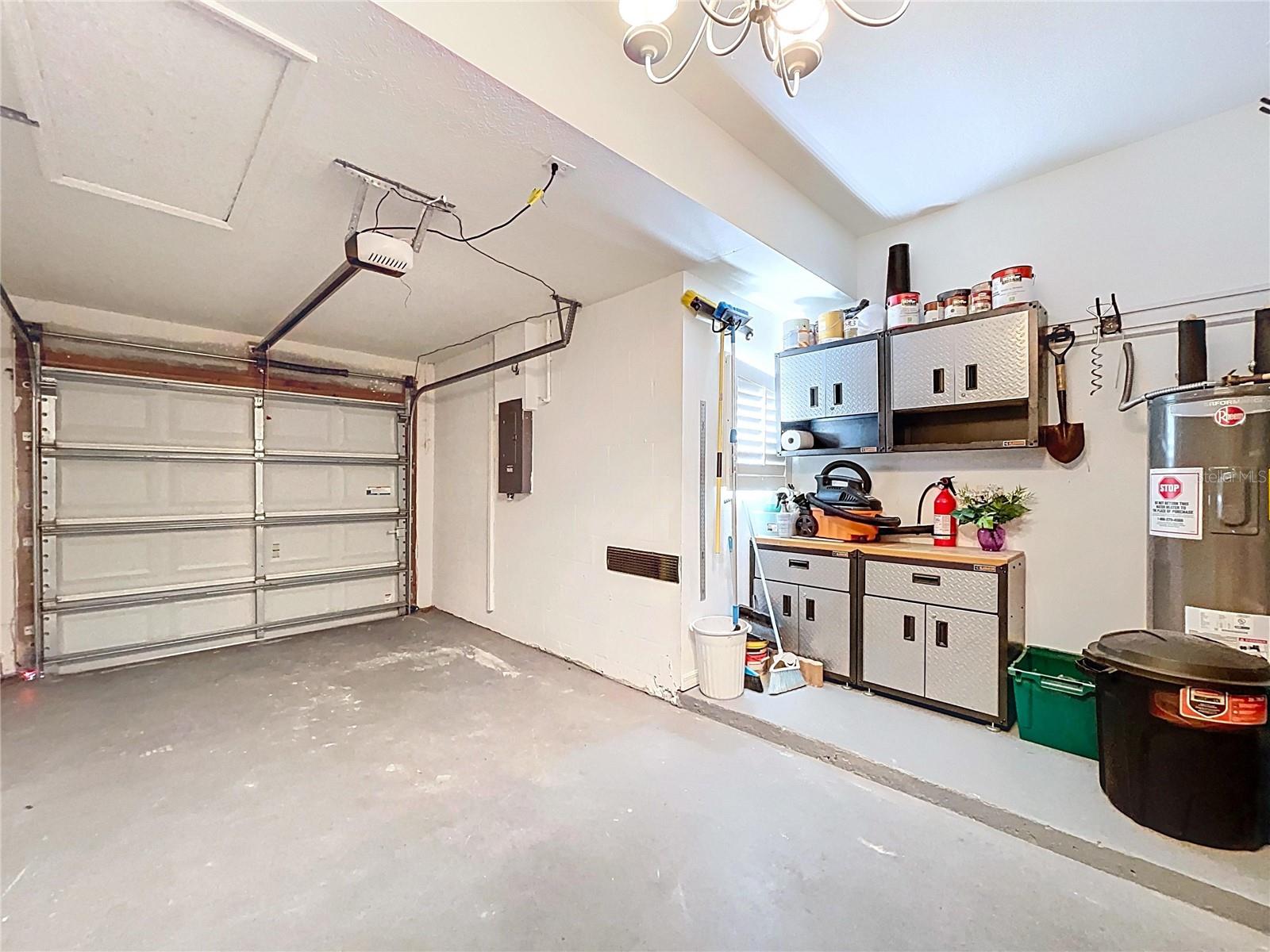 Oversized 1-car garage offers a storage or workshop space.
