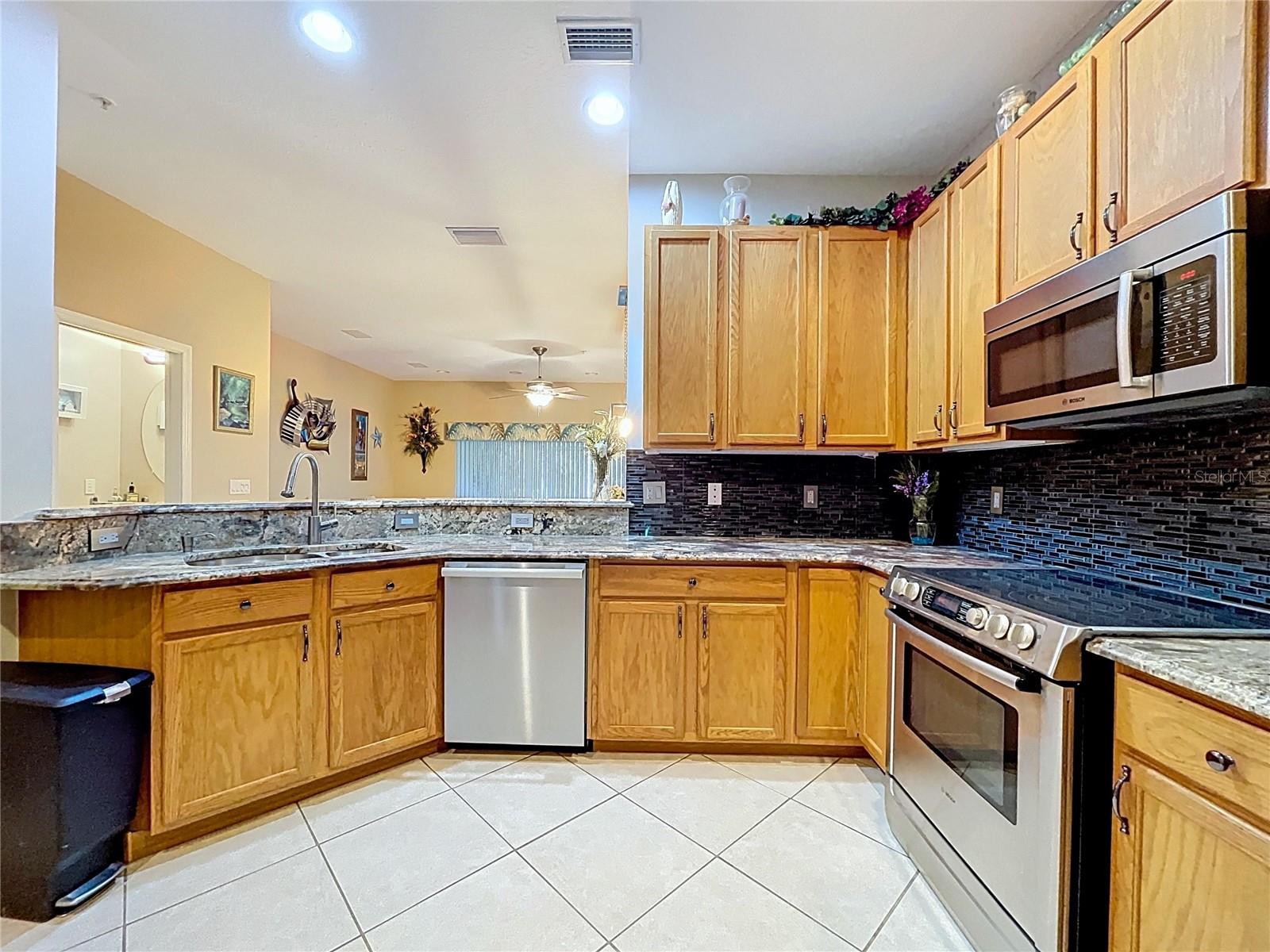 Spacious and open kitchen offers plenty of prep space.
