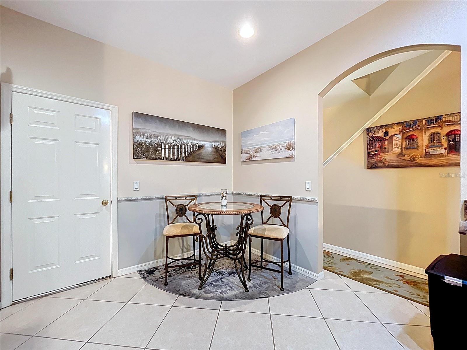 Breakfast nook in the kitchen along with a pantry closet.