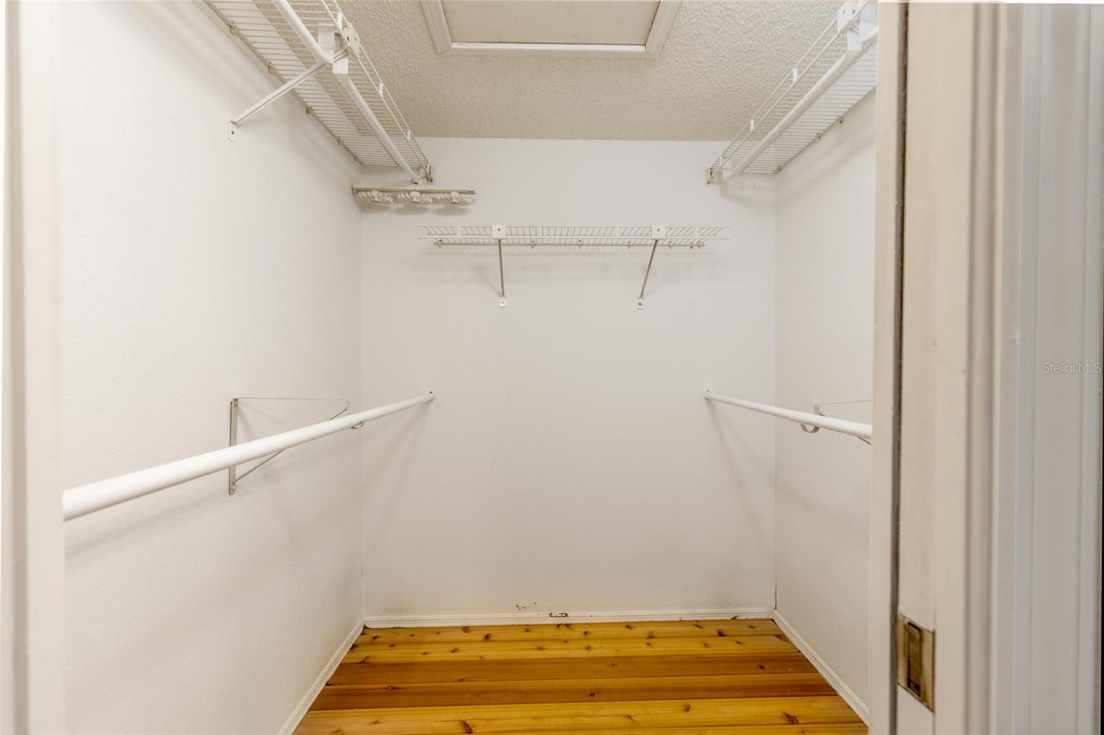 Walk-In Closet in Primary Bedroom