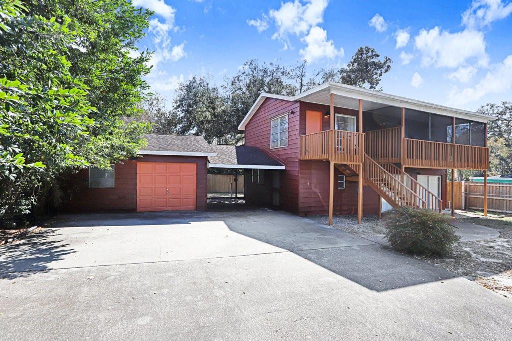 FRONT OF HOME AND GARAGE