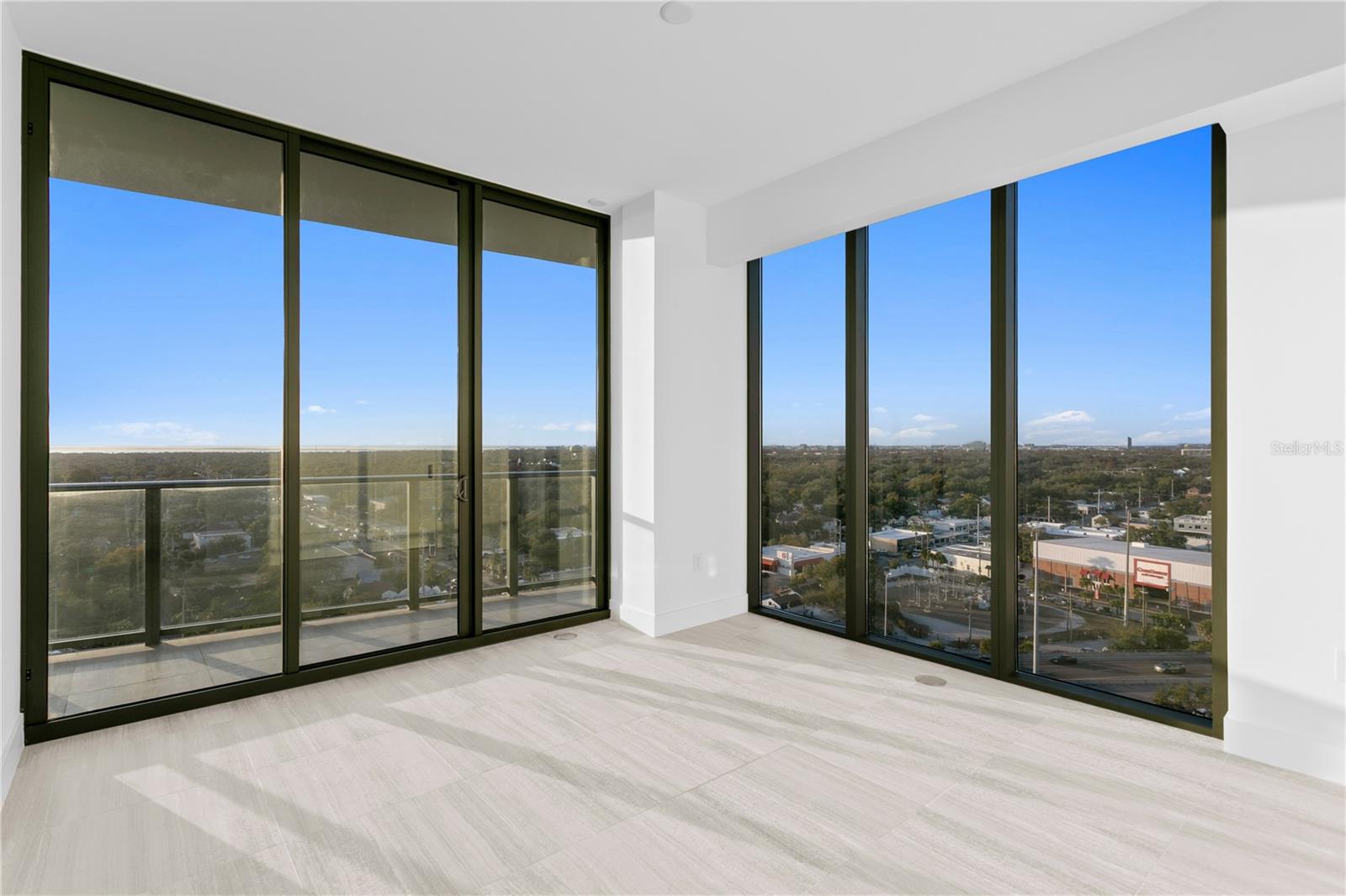Second bedroom with balcony, western and northern views and ensuite bathroom