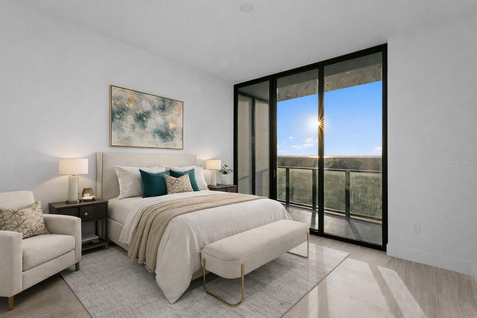 Virtually staged ensuite third bedroom with balcony and southwestern views all the way to St. Pete!