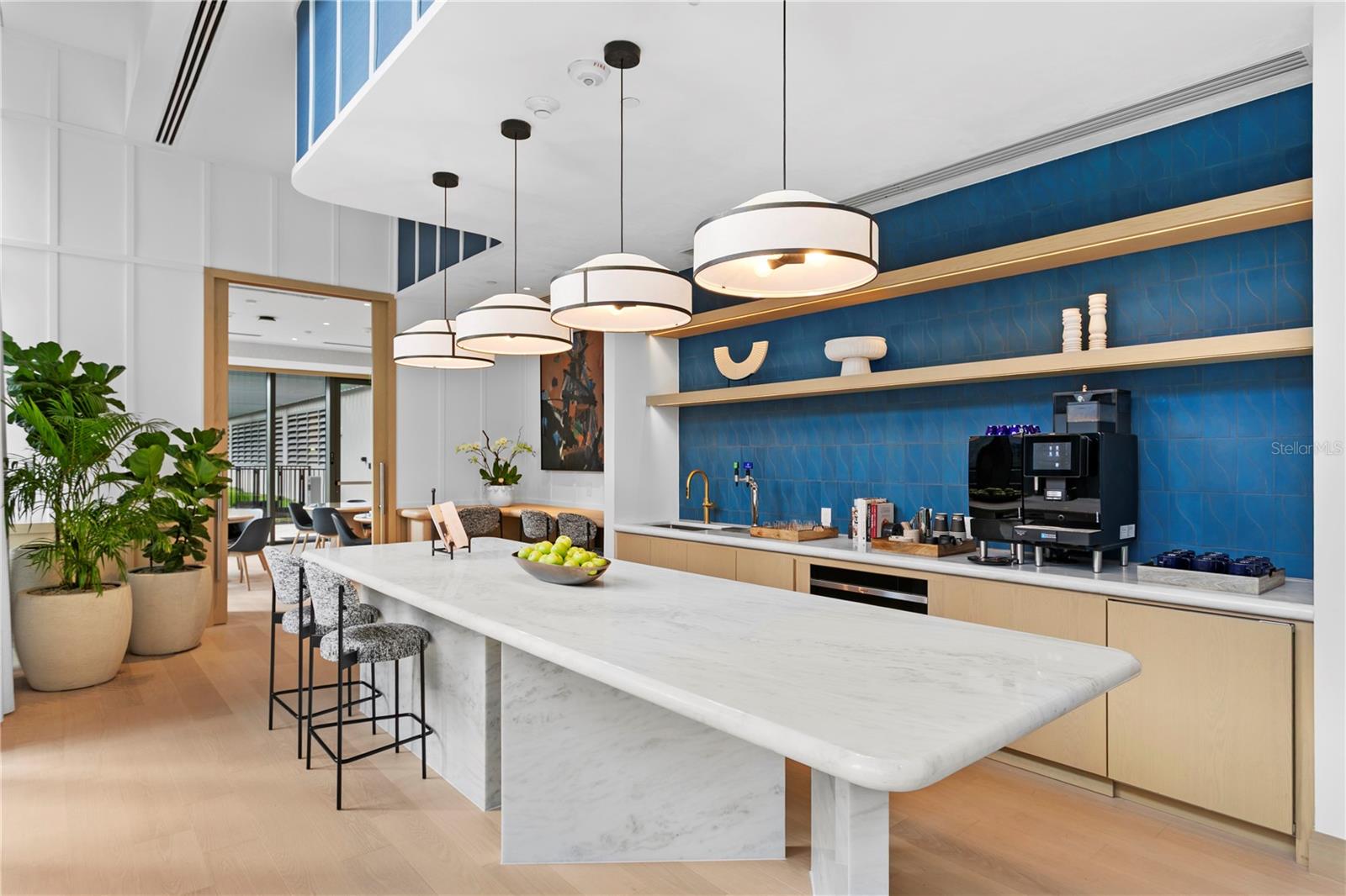 Resident kitchen features daily continental breakfast and world-class coffee and tea bar