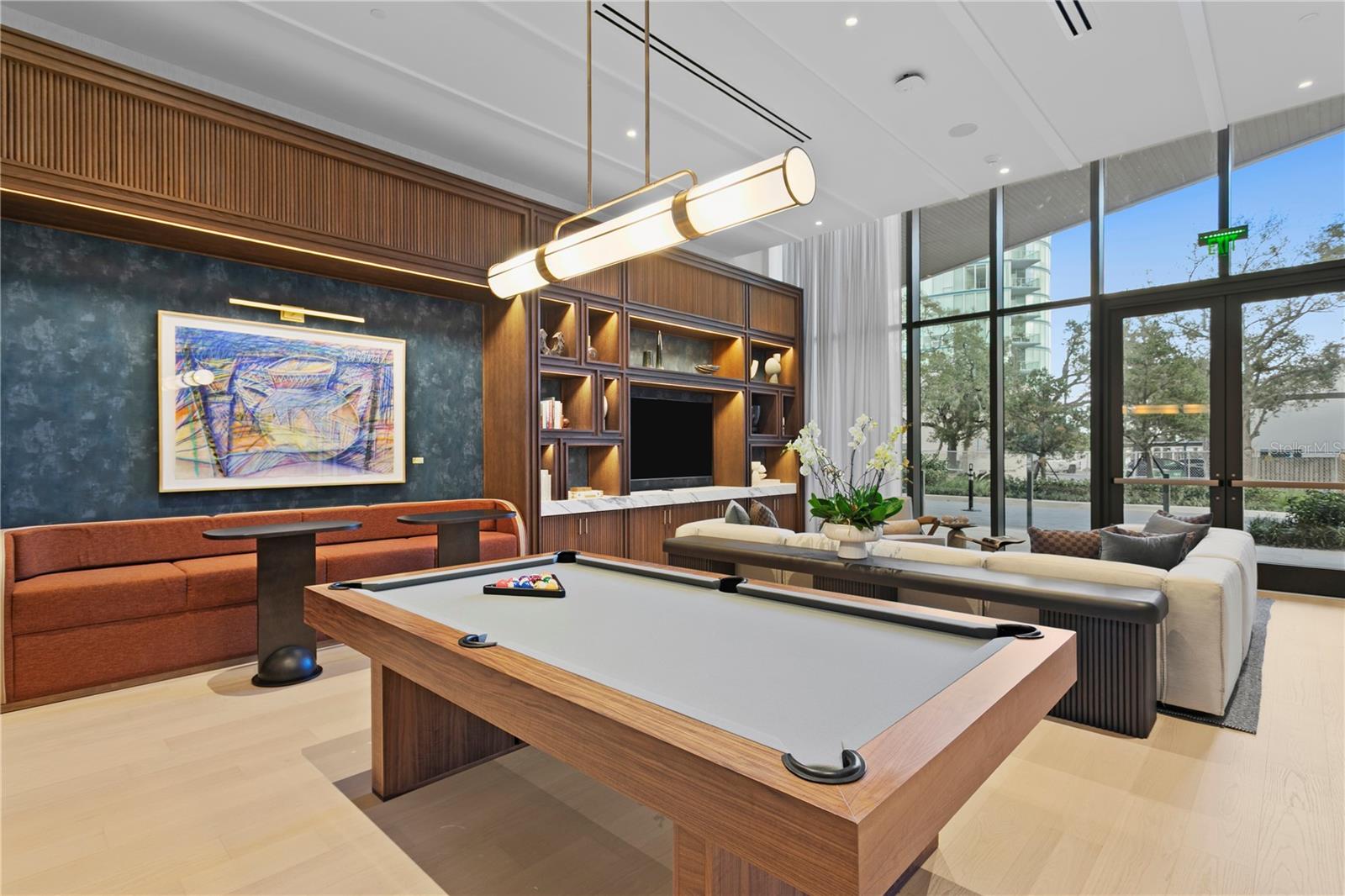 Beautiful billiards and sports lounge can be reserved by residents for any occasion