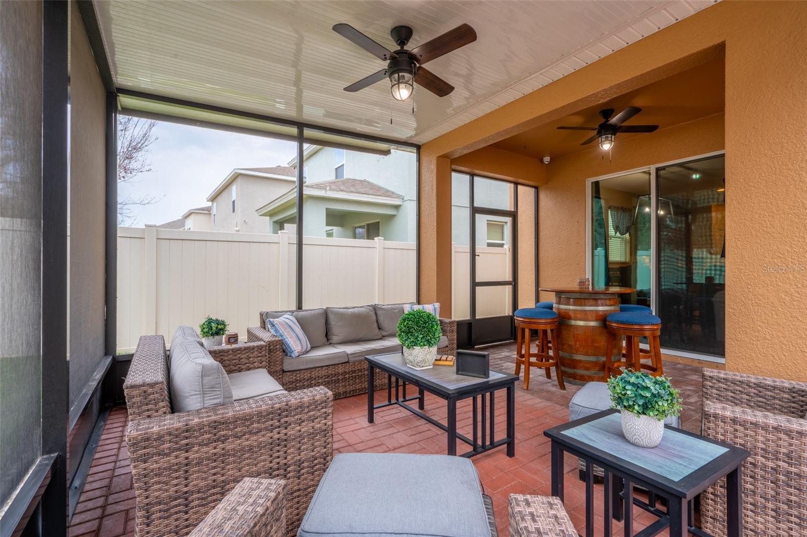 SCREENED IN LANAI COMPLETE WITH BRICK PAVERS